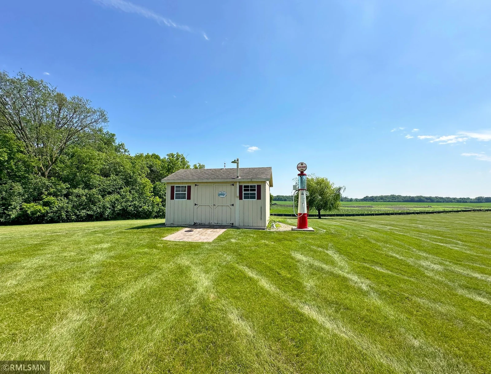 Enjoy a large storage shed offering separate water spigot  electricity and is also connected to the security system.