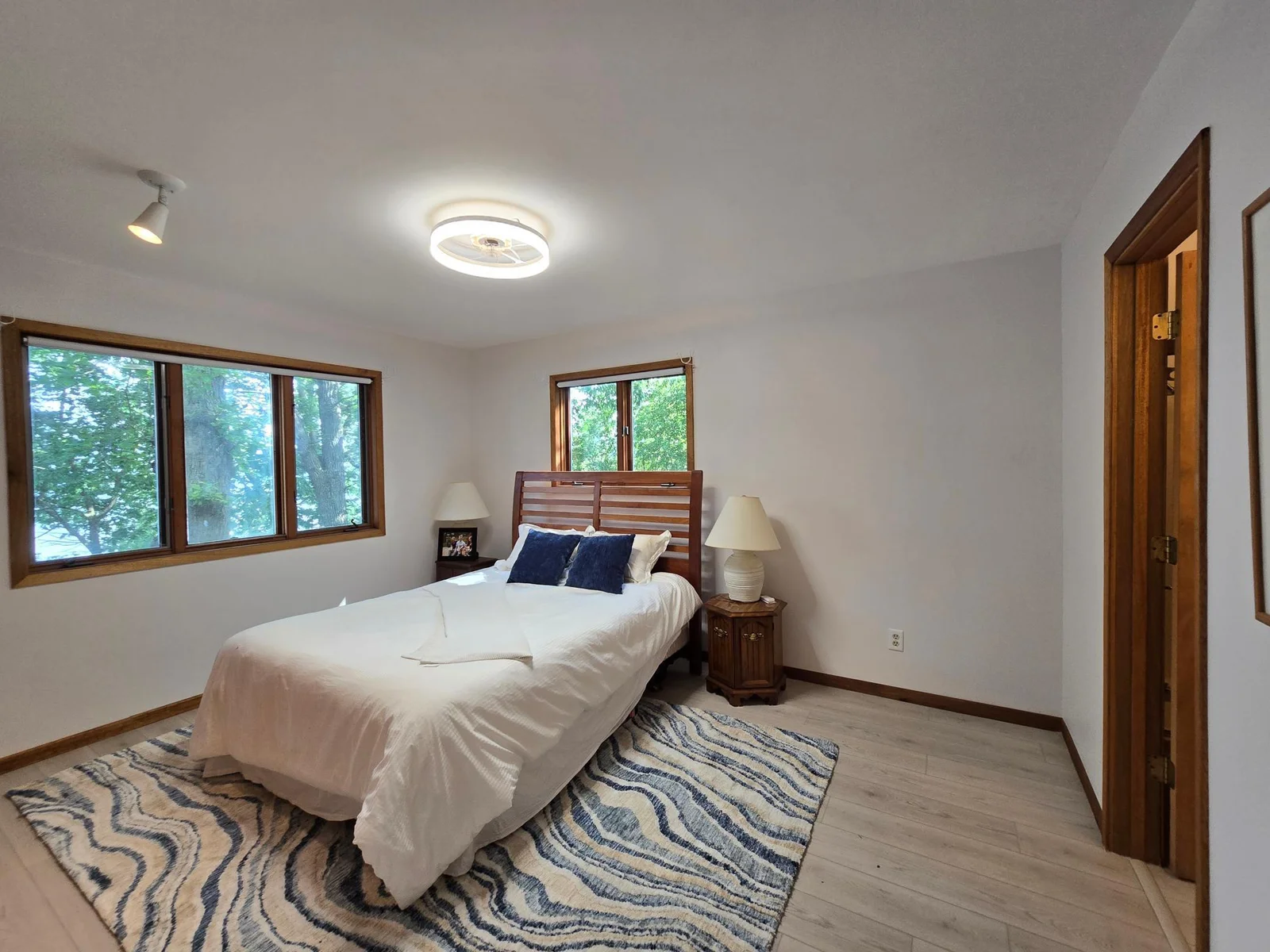Spacious primary bedroom with new lighting/fan