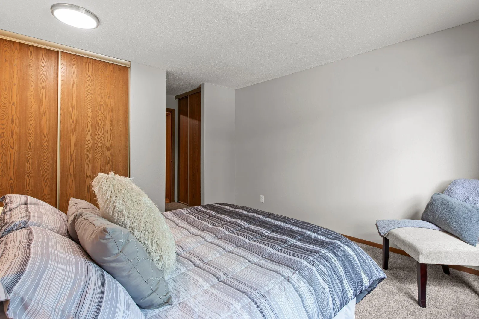A double closet and freshly painted walls are features you'll enjoy in the bedroom