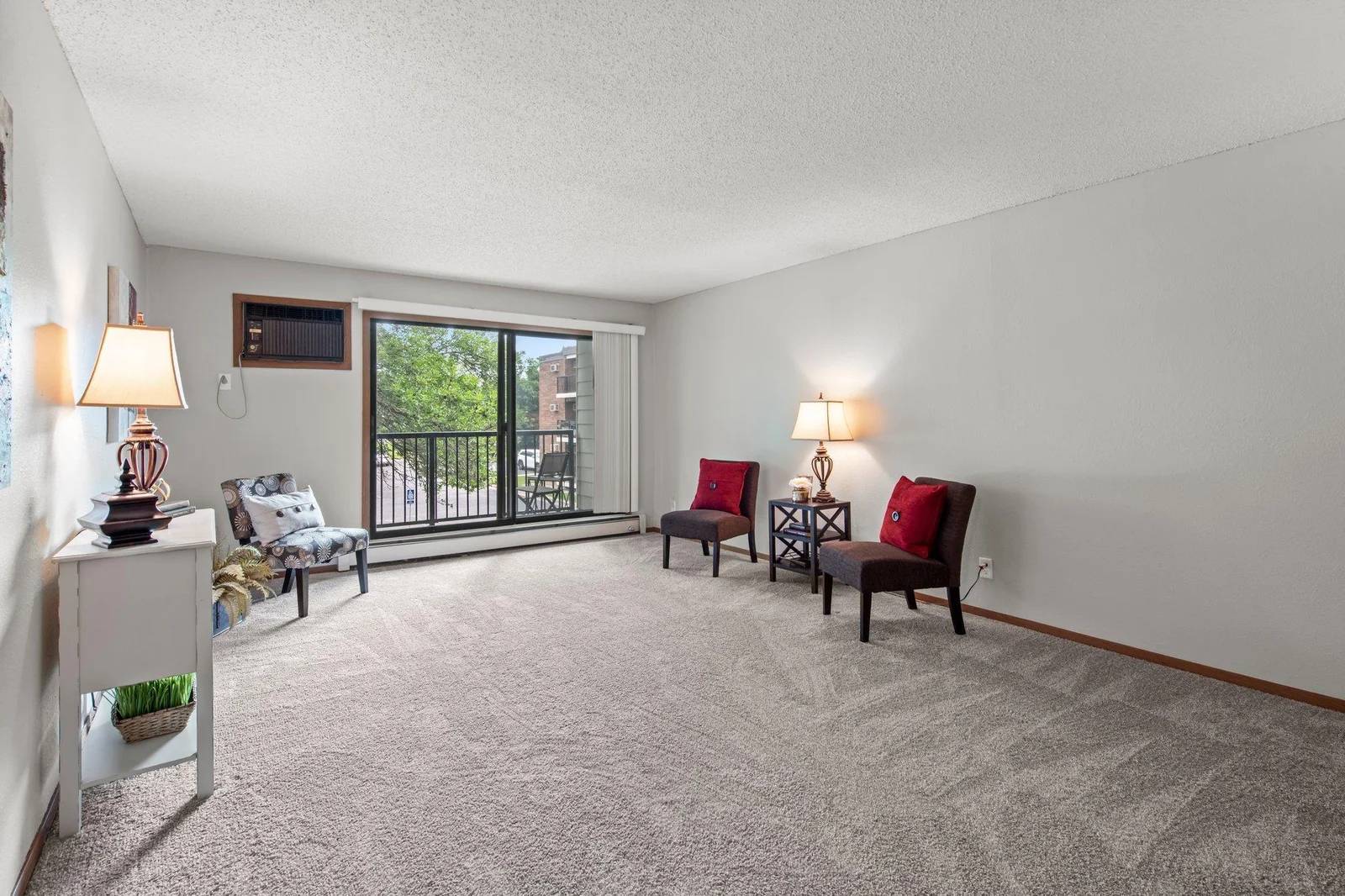 New carpet and fresh painted walls greet you to this move-in ready space!