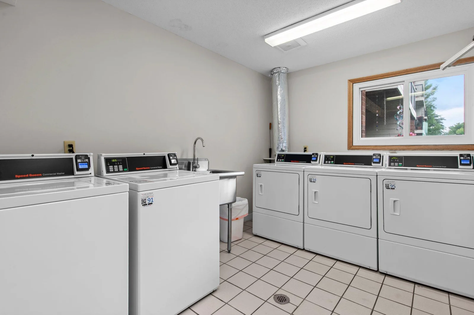 This large, clean and well-equipped laundry room is one of 2 available for use.