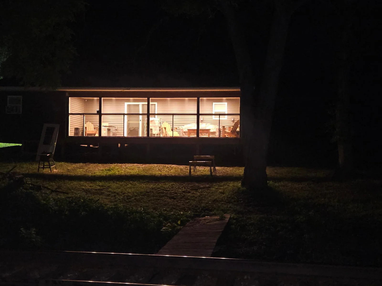 Evening photo of the screened in porch.