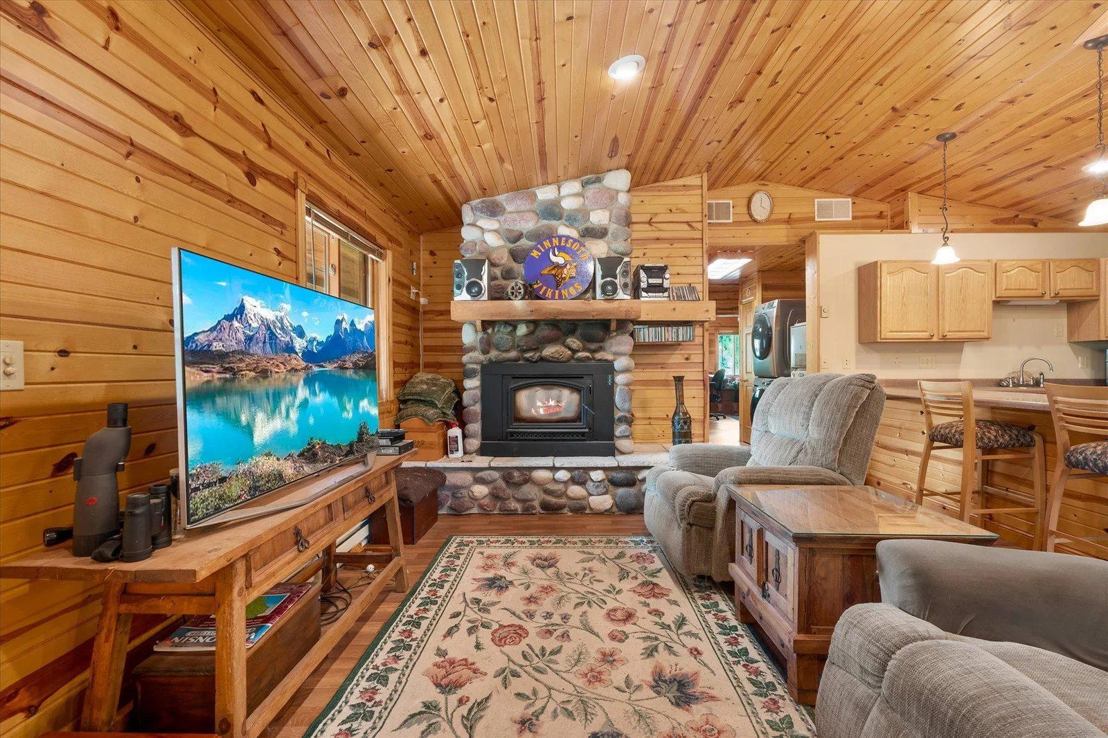 Family room with a Fieldstone fire place