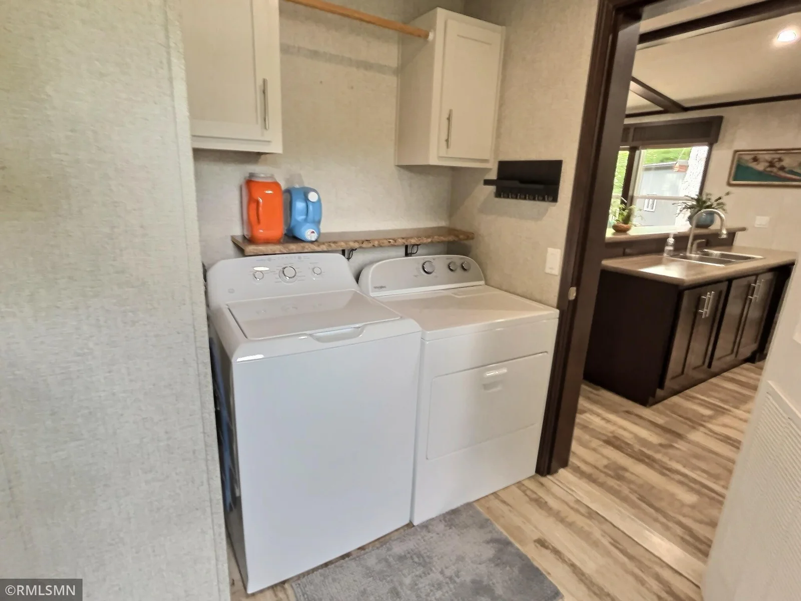 The handy laundry area at entrance of home.