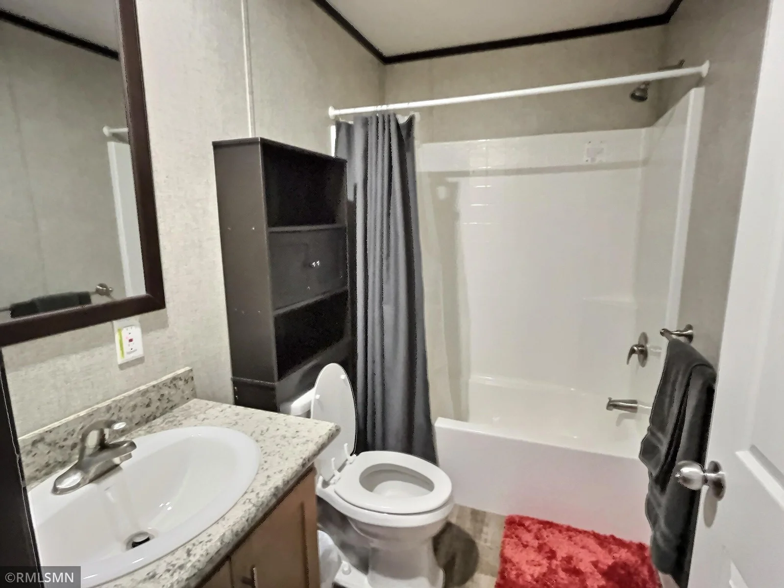 this second full bath is in close proximity to two of the bedrooms.