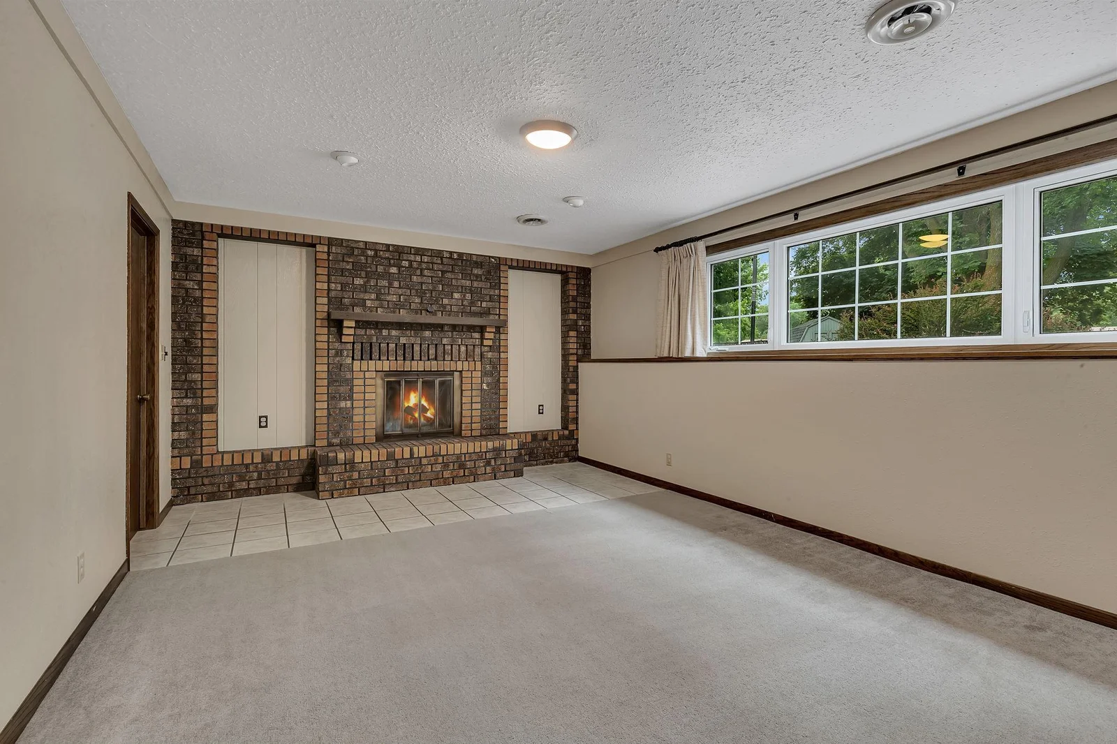 Family room w wood burning fp