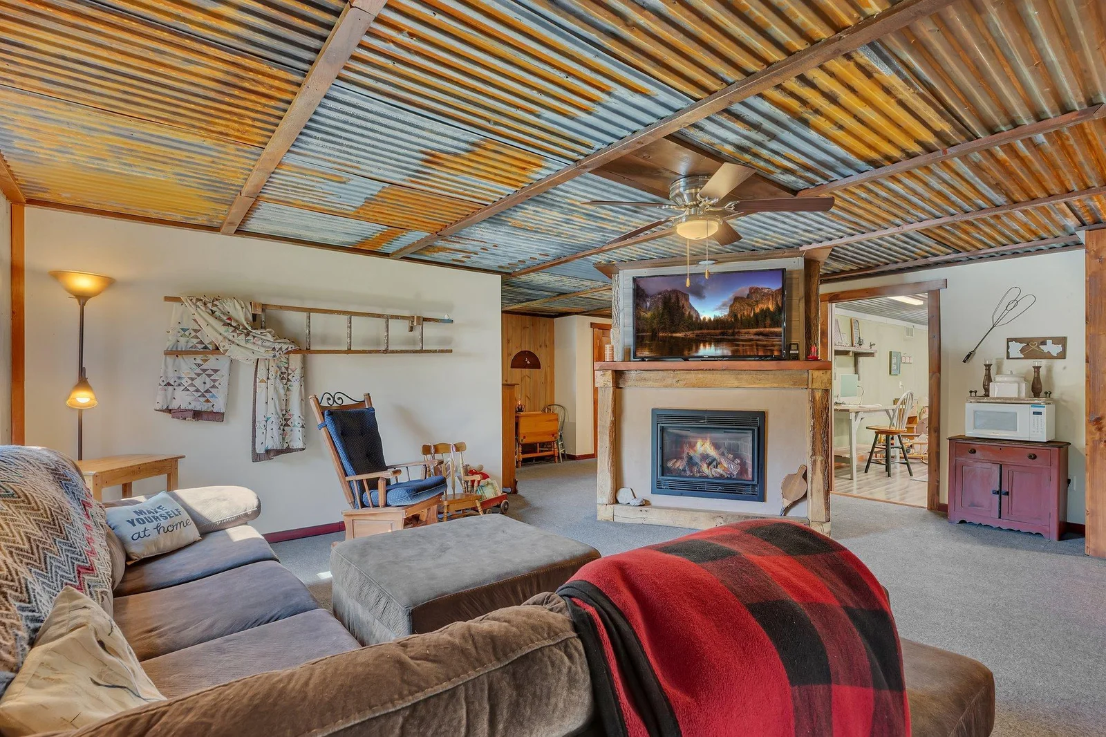 Living room/TV area (upstairs).jpg