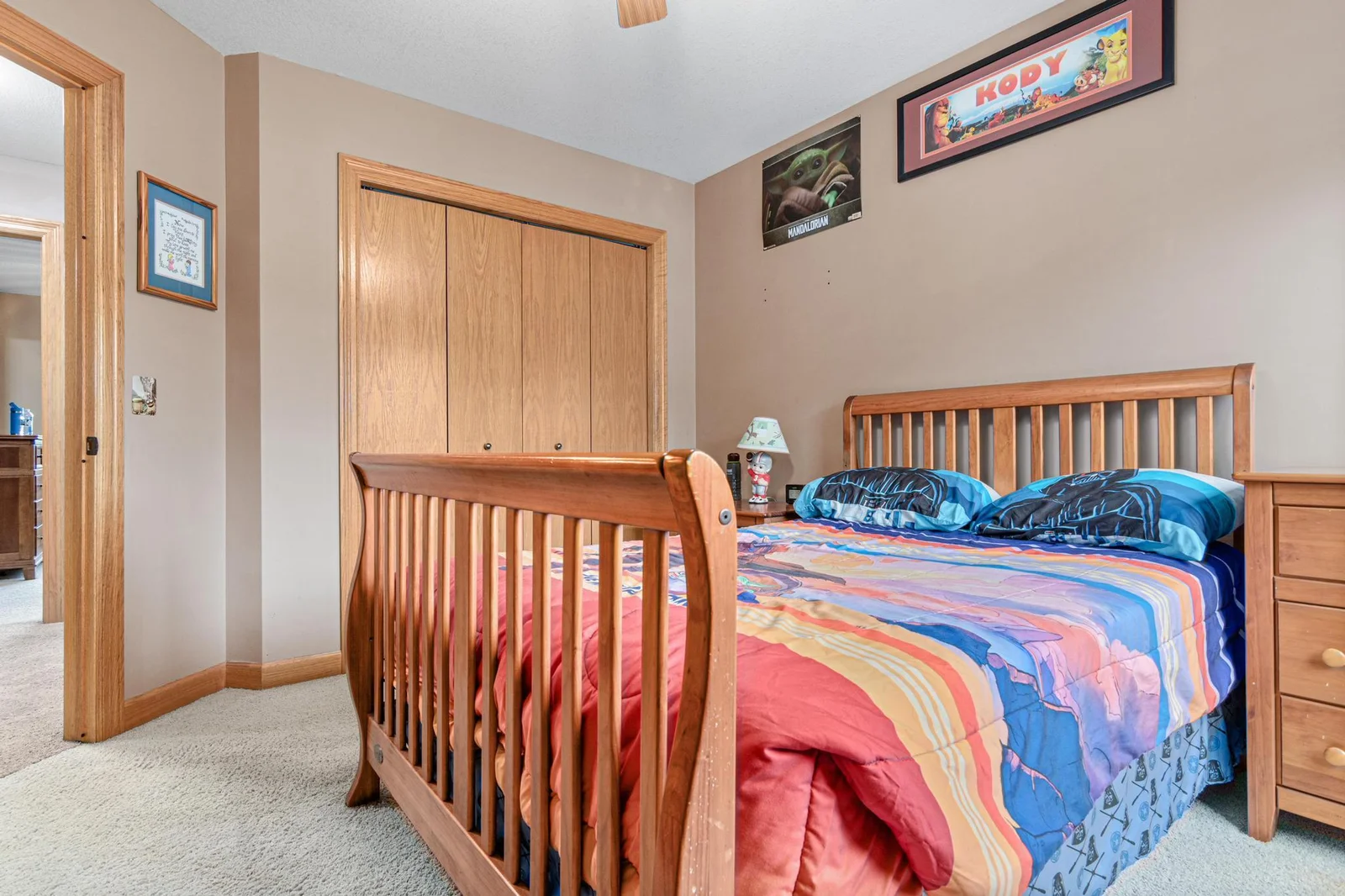 Another view of the second bedroom on the upper level. All the bedrooms have ceiling fans.