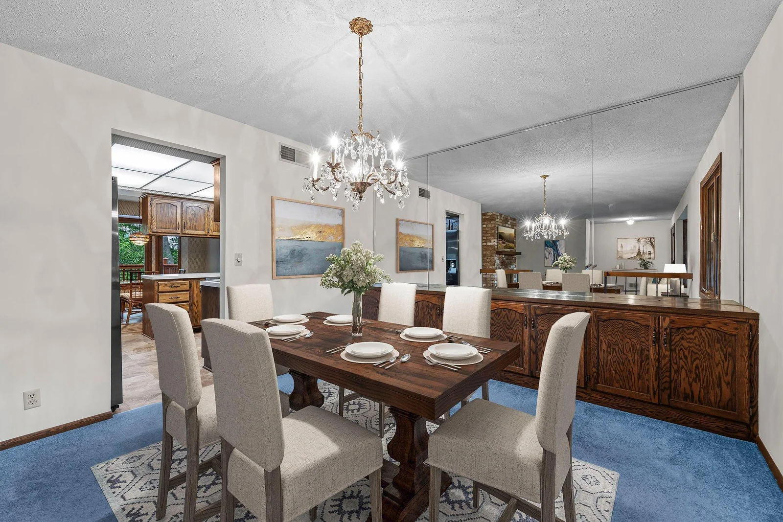 The formal dining room has a wonderful built-in buffet which is perfect to store all your service pieces and china. The chandelier adds a touch of elegance to the room. This room has been virtually staged.
