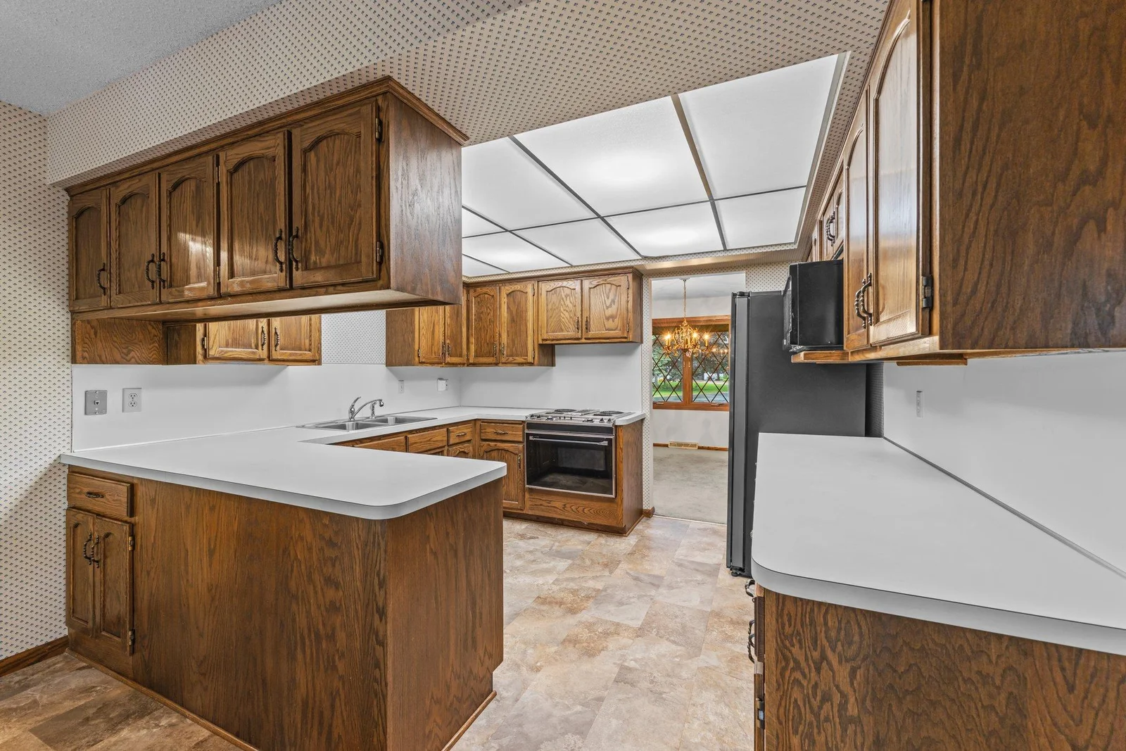 View of the kitchen from the informal dining space.