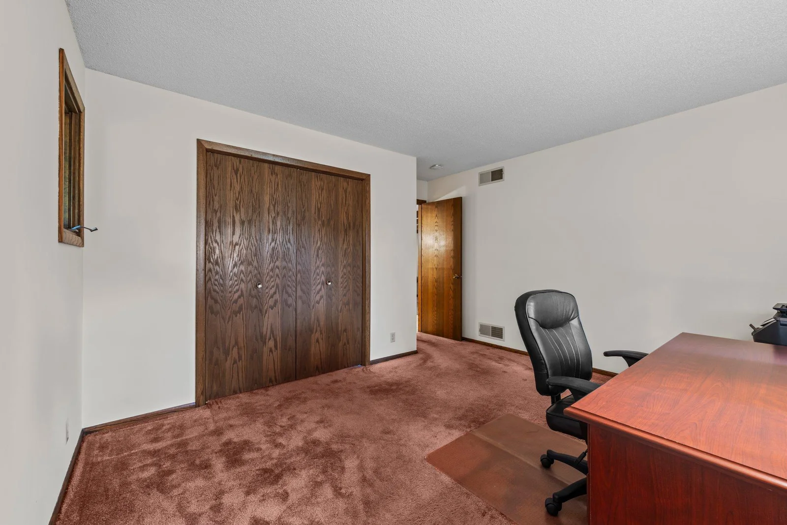 Alternate view of the second main floor bedroom.