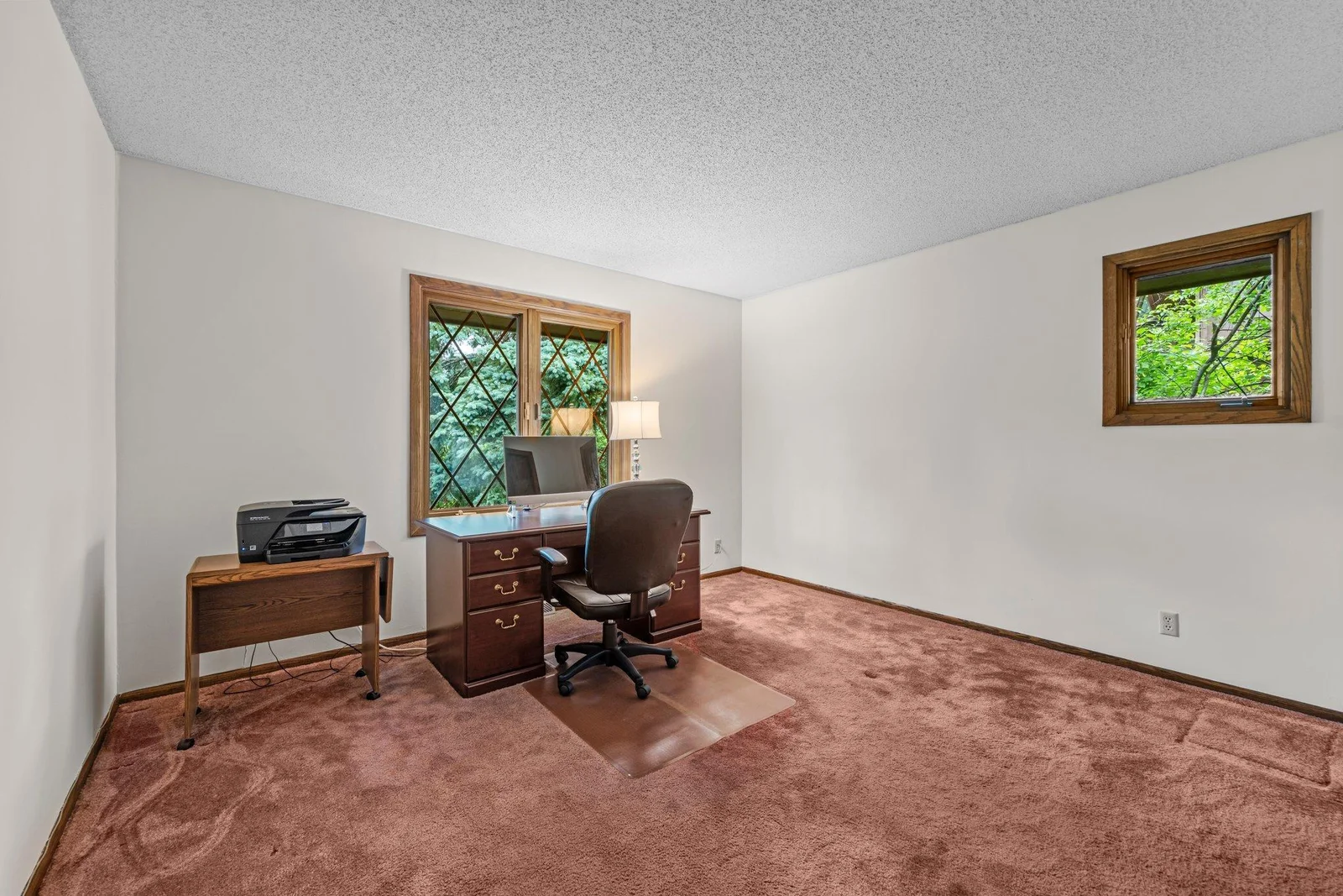This second main floor bedroom faces the street. It is currently being used as an office.