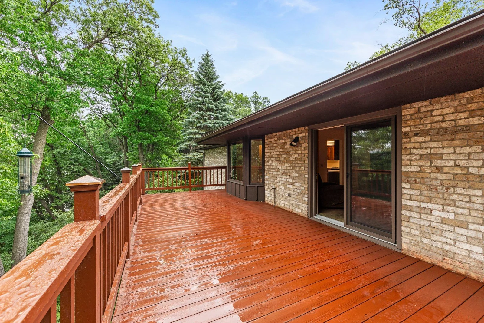 Upper level deck. Take in the sounds of nature from this lovely space.