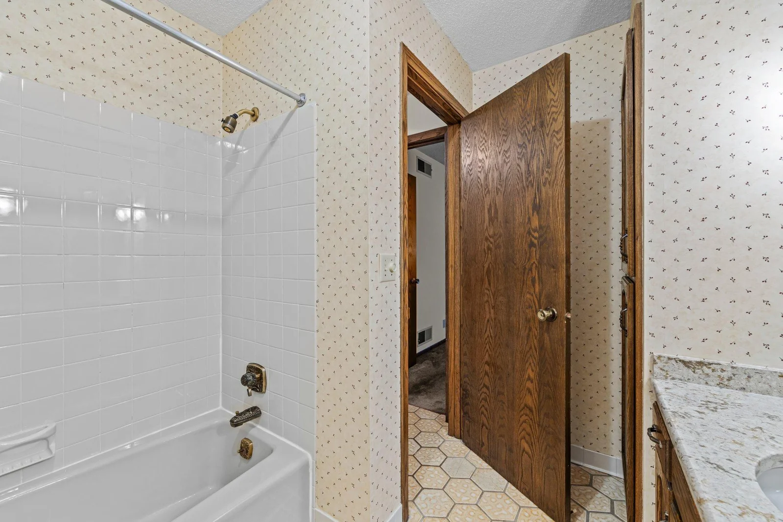 Second view of the main floor full bathroom. 1267 Nursery Hill Ln