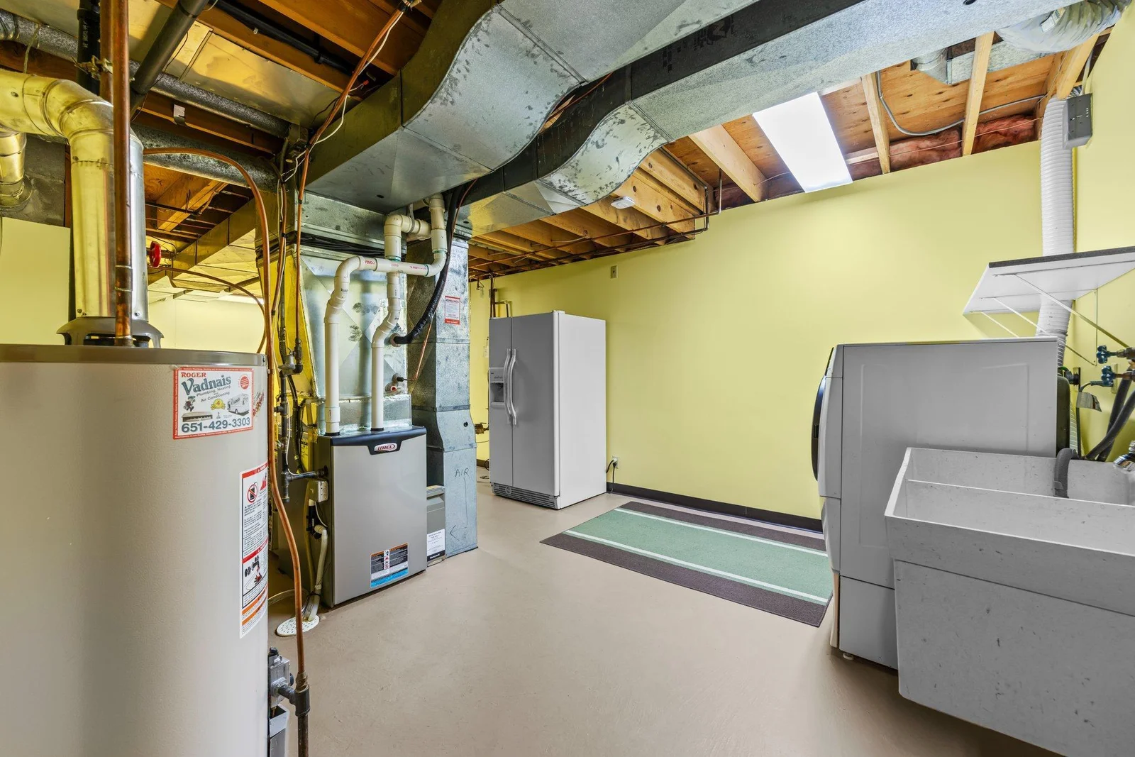 You will love the large utility room. The additional refrigerator can stay with the property.