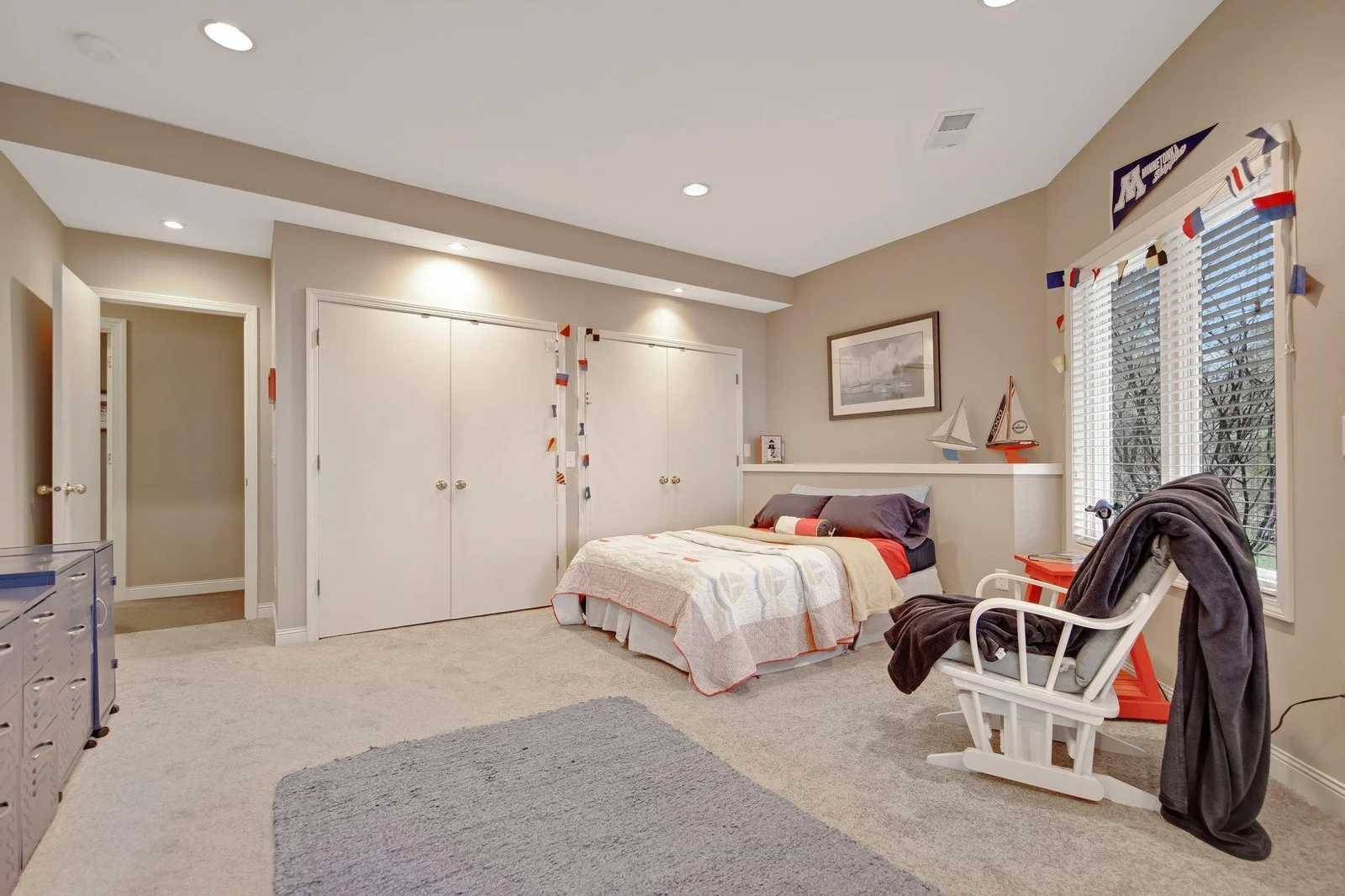 a third lower level large bedroom - the lower level has its own zone heating, separate from the main level.  Again, lots of closet space - with views of the lake.  The home was custom designed to give all bedrooms views of the lake.