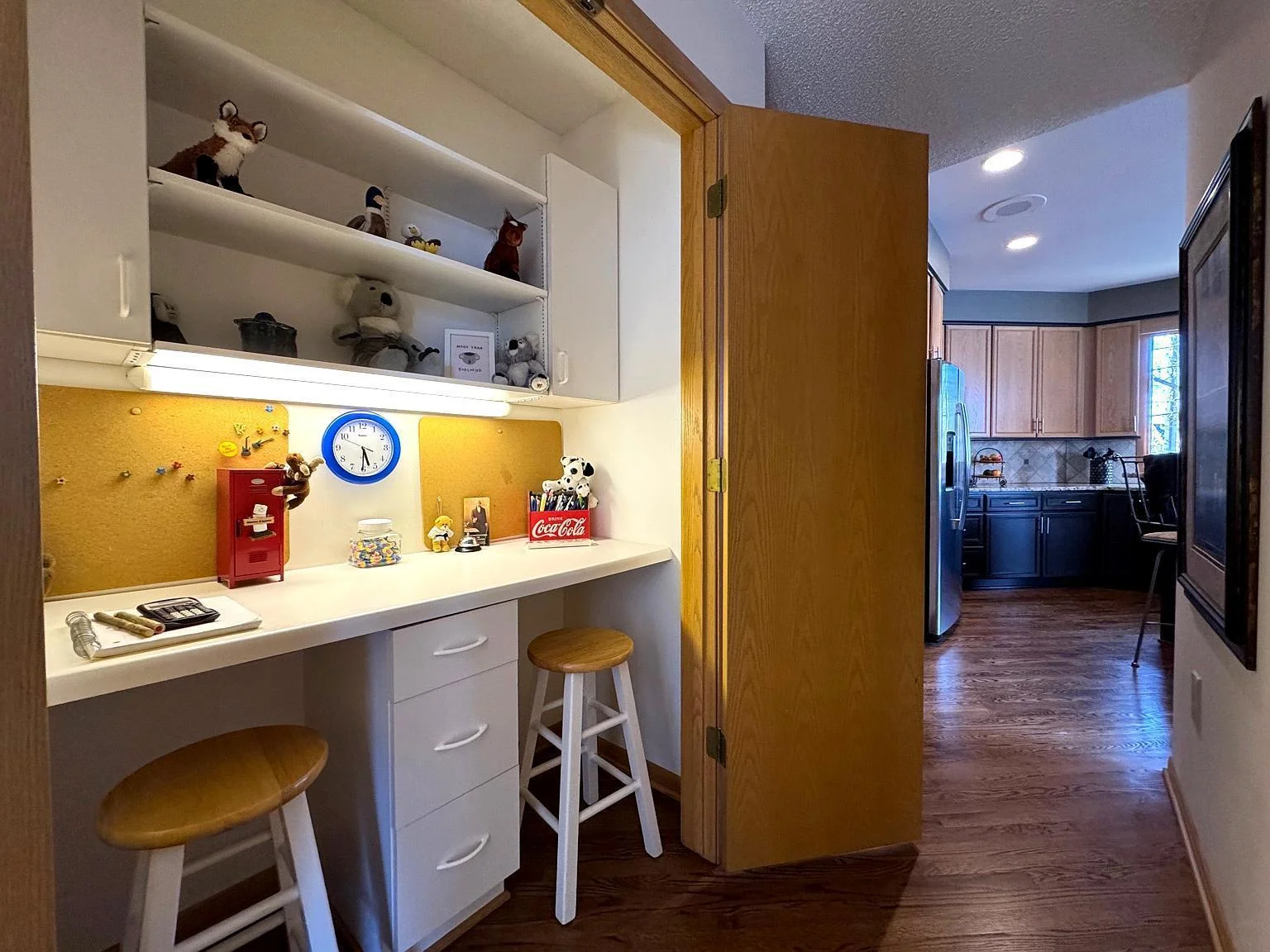 Study area off of the kitchen with space to do homework, work from home and has plenty of storage