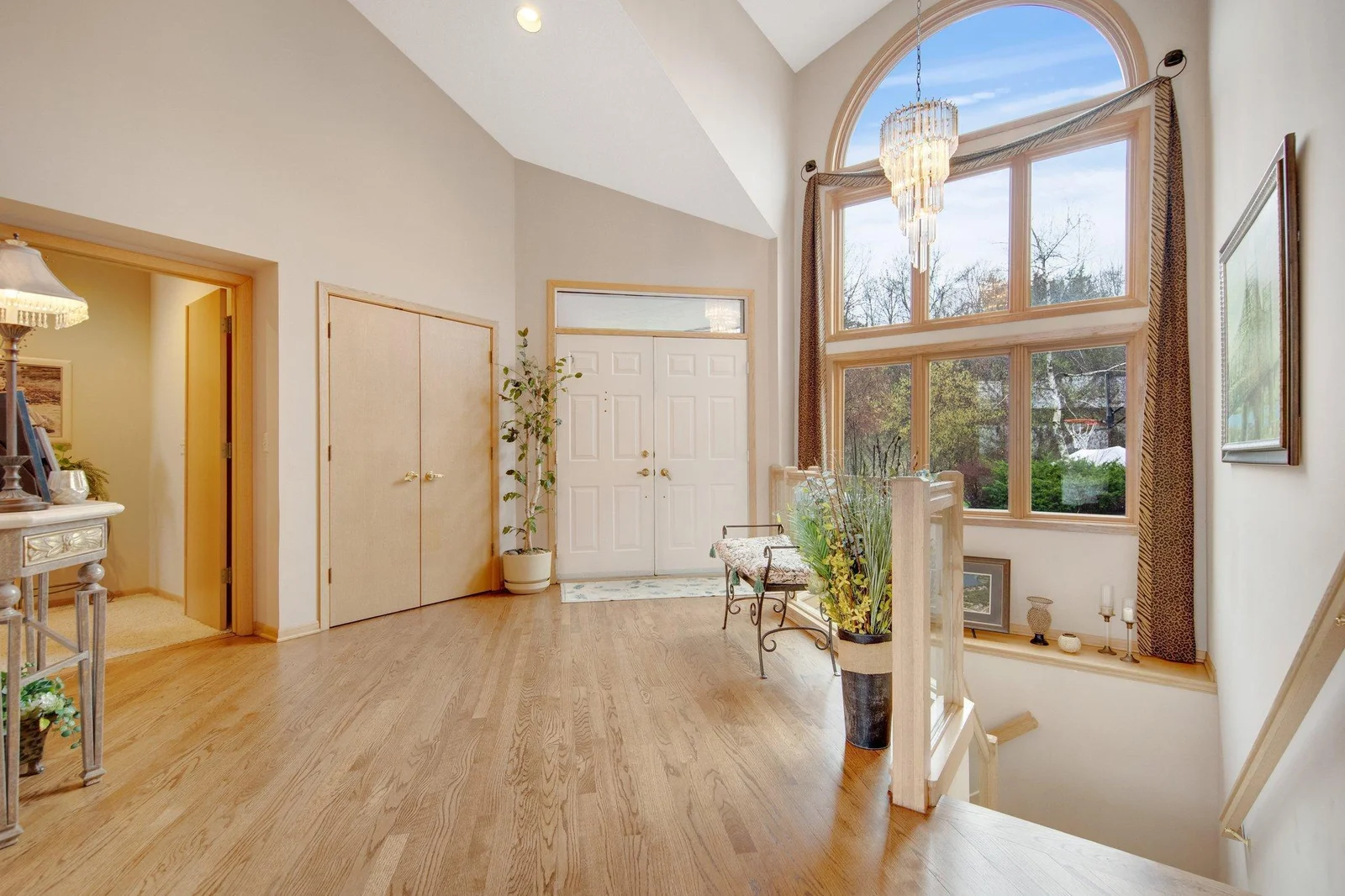 Grand entrance - beautiful hardwood flooring and large front closet.