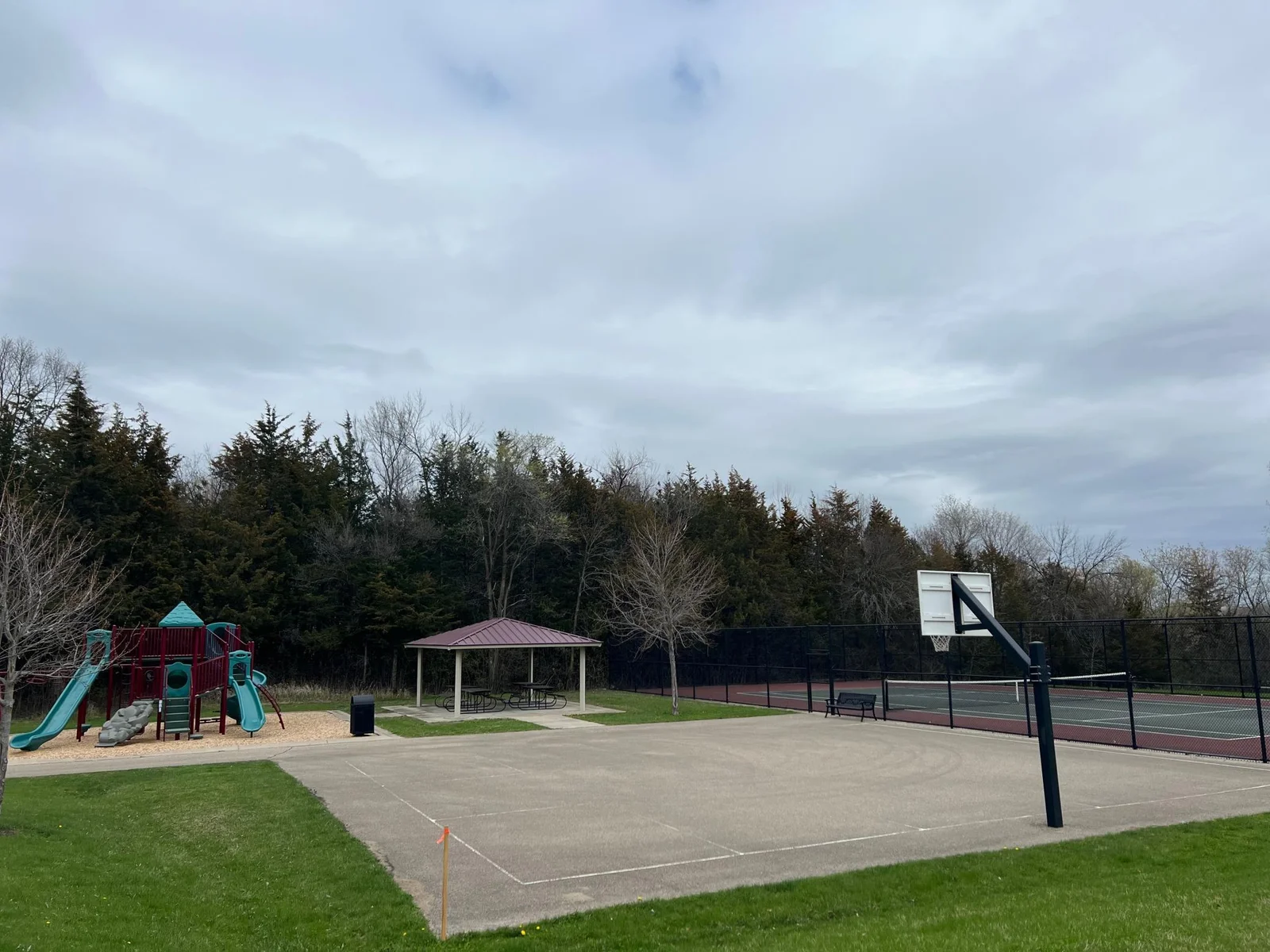playground just steps from the home located between the home and highway 7 - playground, tennis courts, basketball and picnic area.