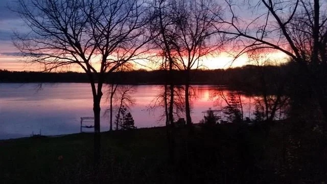 This stunning rambler boasts breathtaking Lake Virginia views, built on one of the neighborhood's widest lots for expansive, single-story living with additional bedrooms and entertainment areas in the Lower level of home.