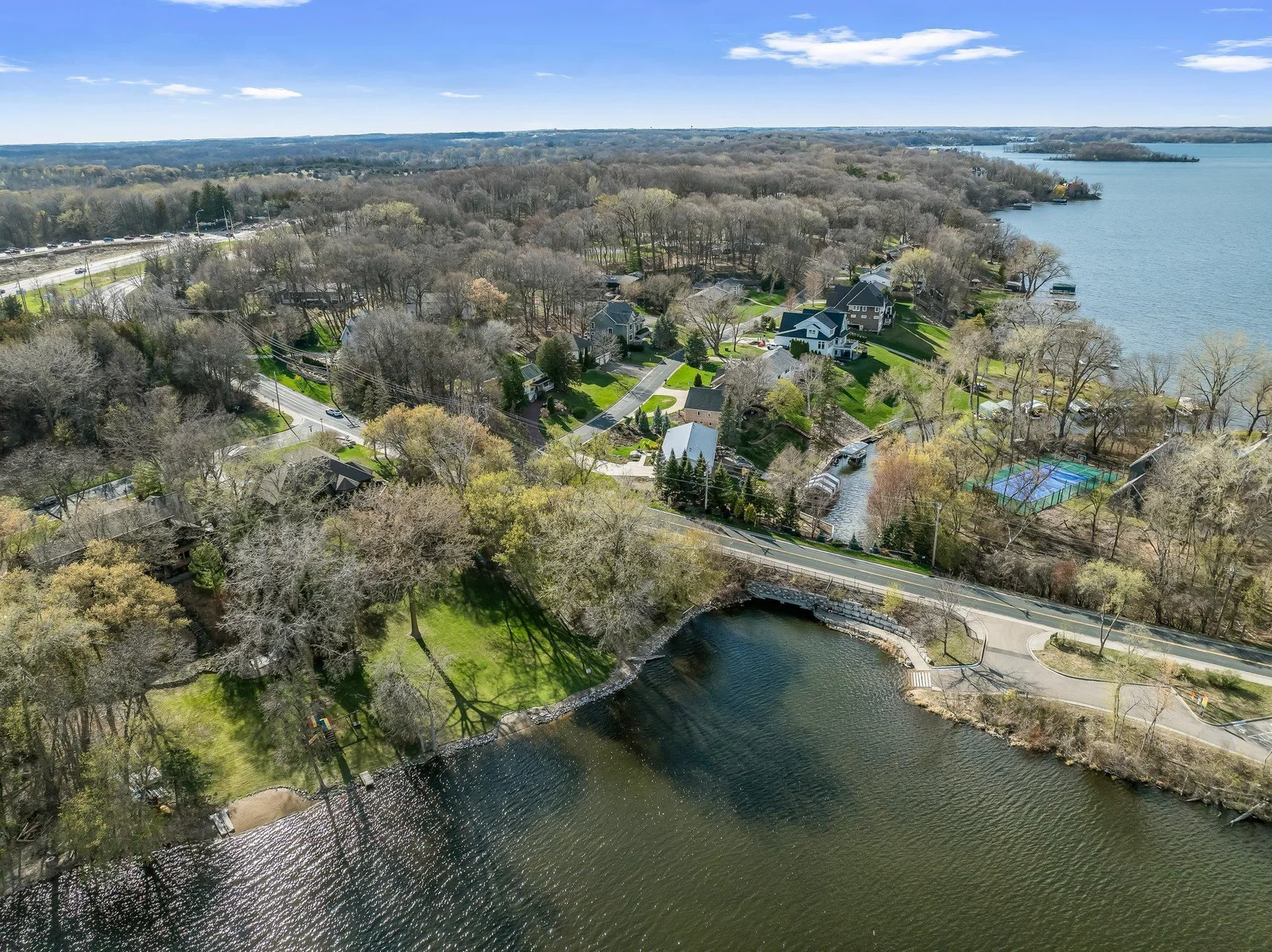 Aerial view of the back yard.  Lake Virginia flows into Lake Minnetonka - when the water is low, one can canoe or kayak through the channel onto Lake Minnetonka