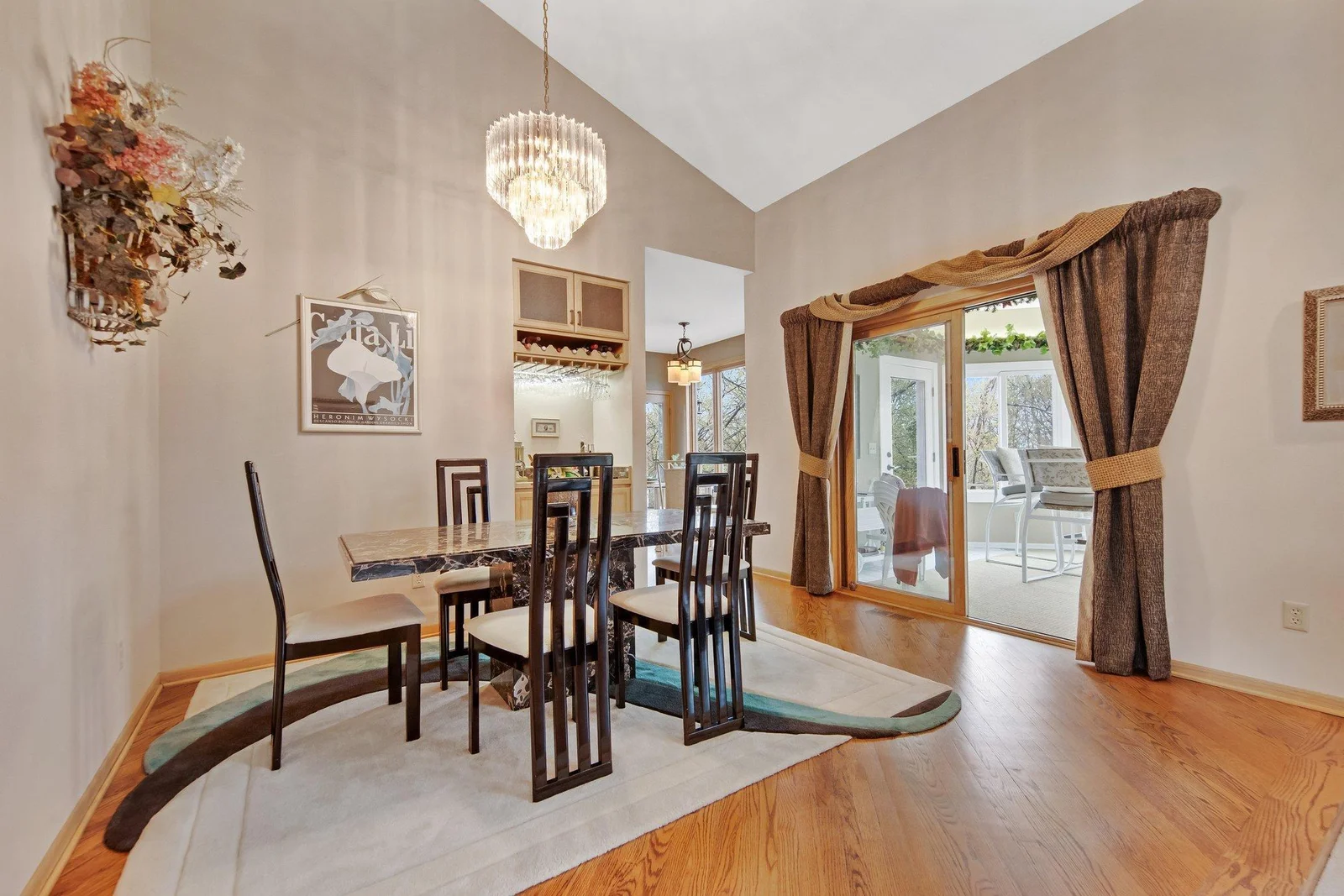 Formal dining room - large sliding glass doors brings you out into the porch which gives you even better views of the lake