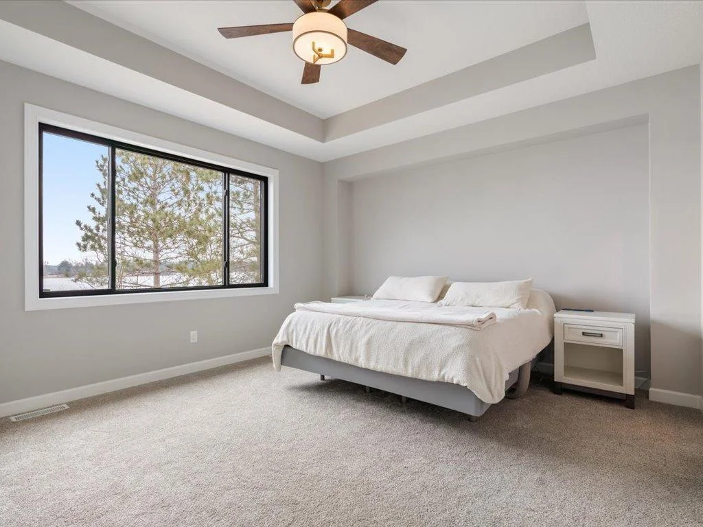 Master bedroom with amazing views of the lake.