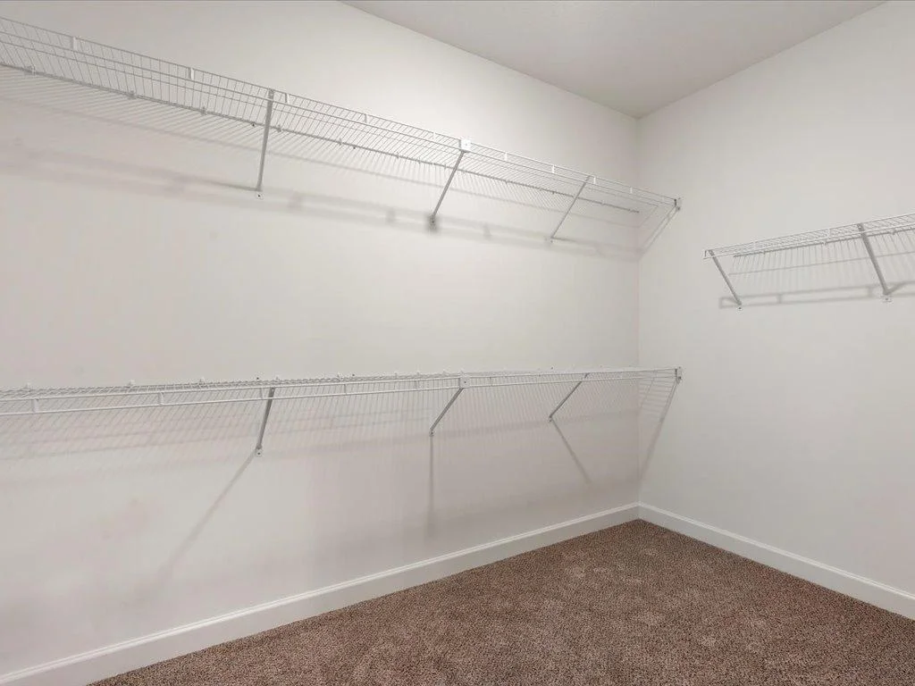 Walk in closet for all the lake clothes.