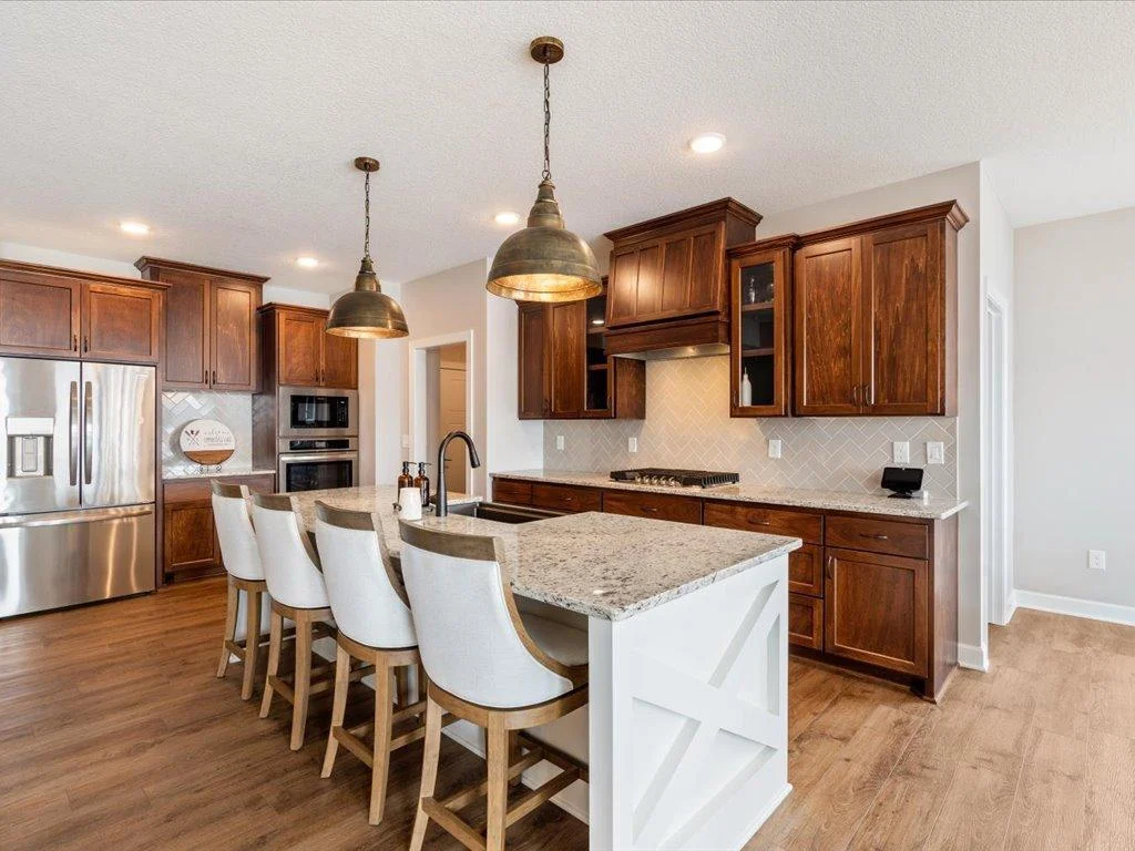 Large granite island great for entertaining.