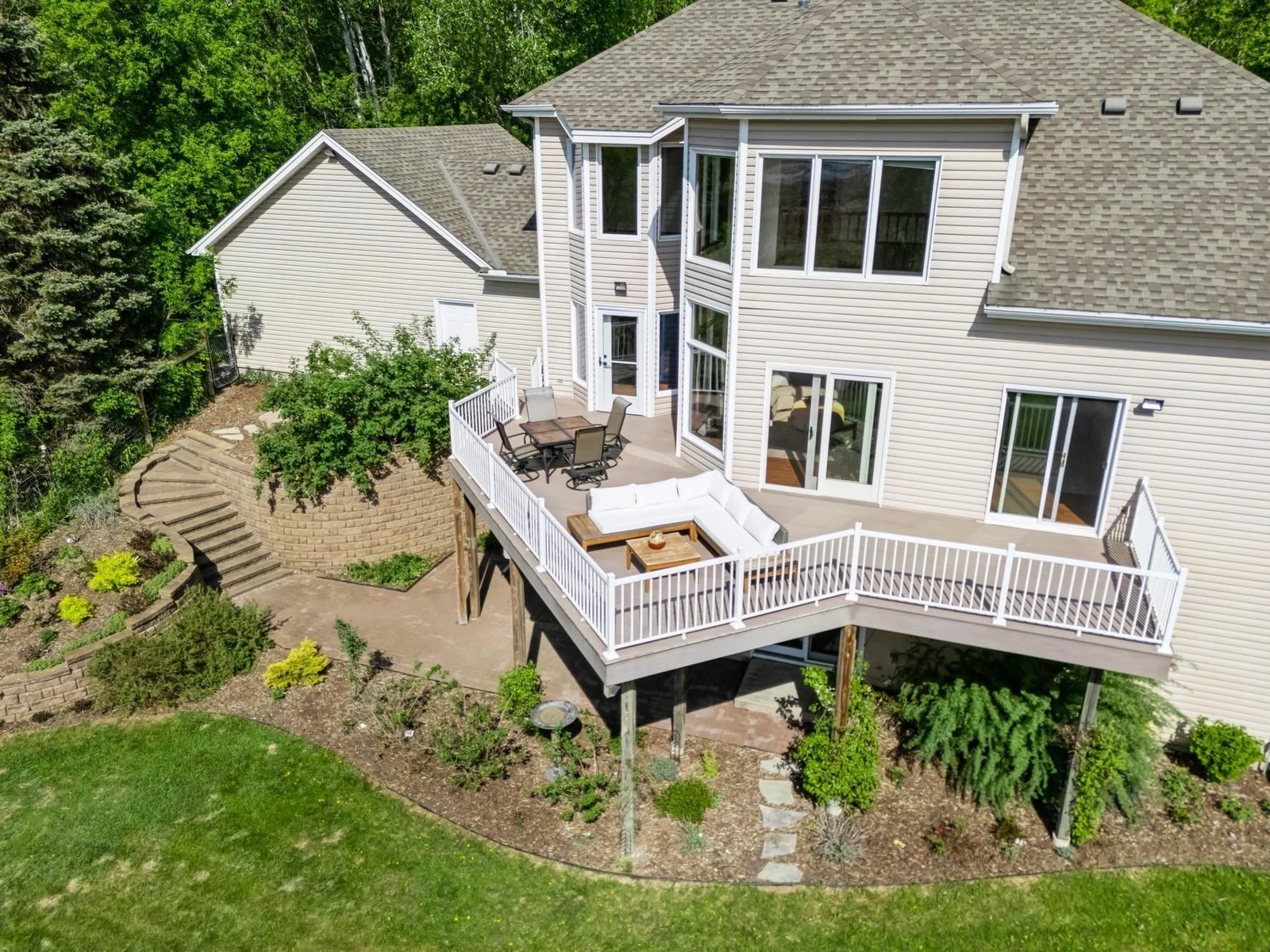 Grill or enjoy a glass of wine while taking in the gorgeous sunsets and nature views from the maintenance free deck.