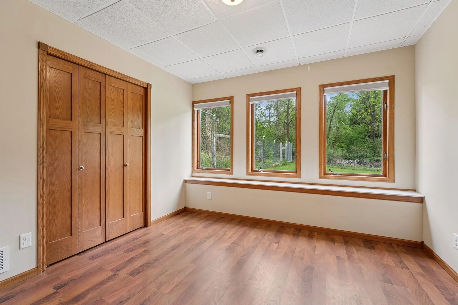 Other lower level bedroom with nice large closet and bench area