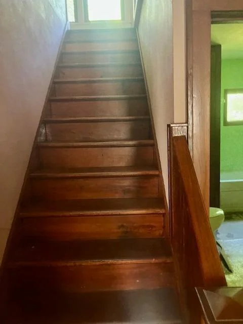 wood stairway to upper level.jpg