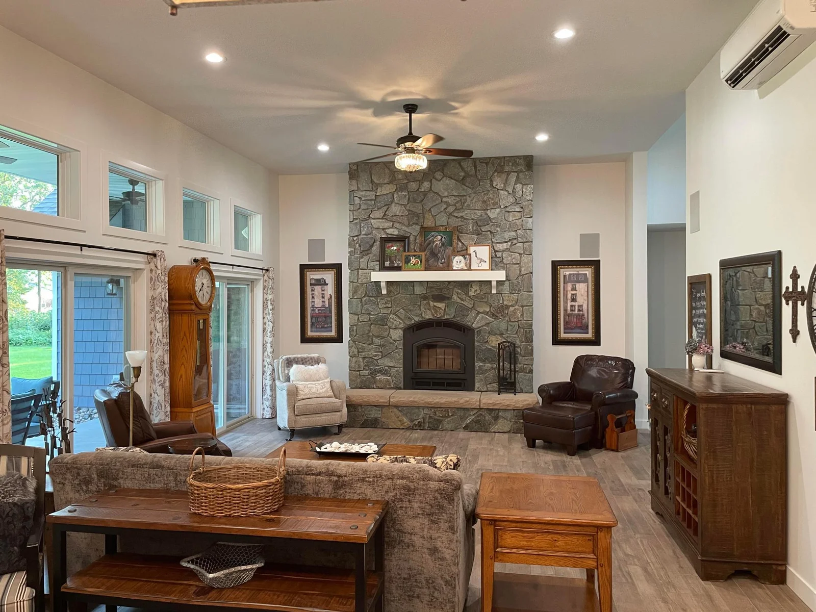 Living room wood fireplace. 12 foot ceilings.