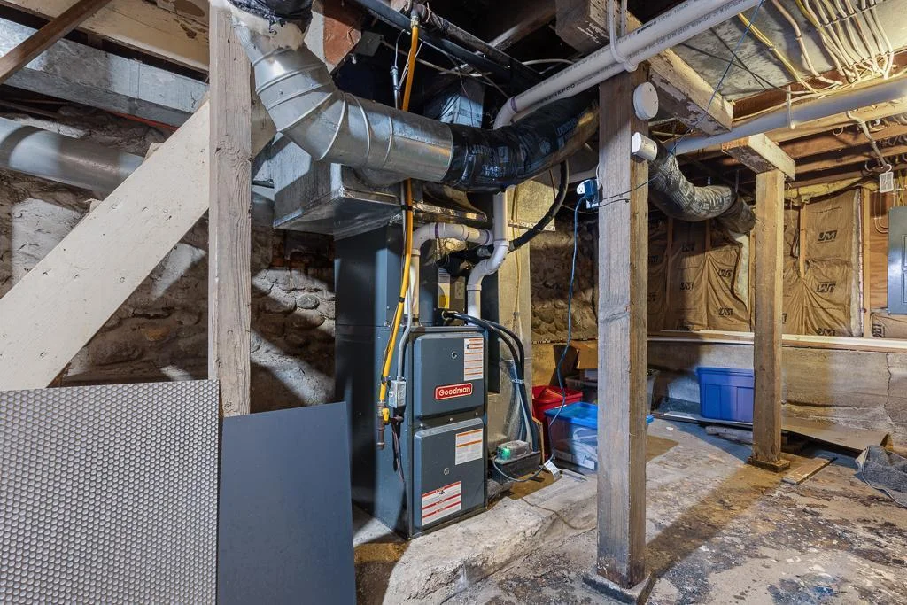 The basement offers ample storage along with major updates, including a 2019 HVAC system and a 2023 water heater—adding efficiency and value to the home.