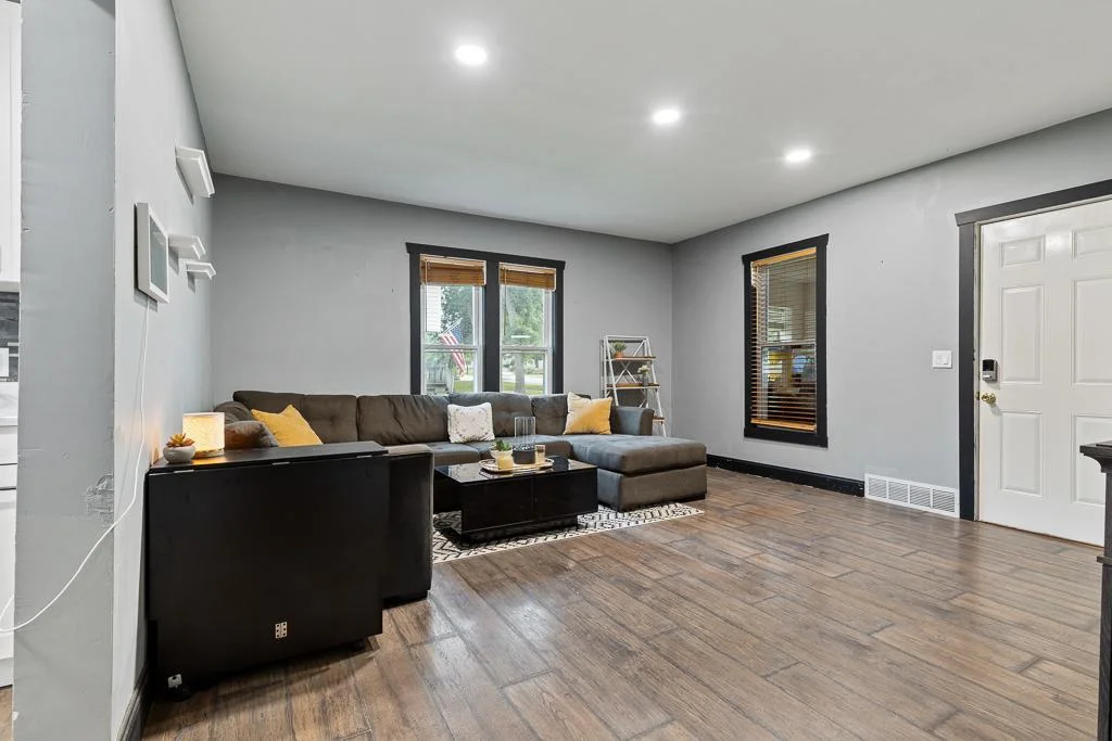 The home features newer windows installed in 2019, providing improved insulation, natural light, and a fresh look throughout.