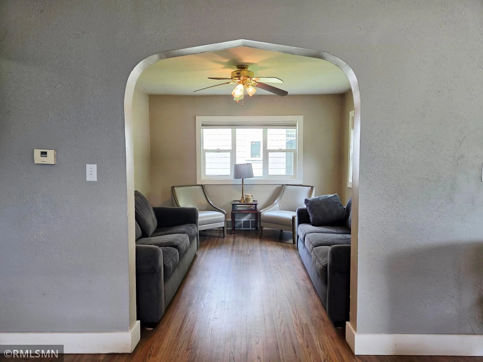 Graceful arches and vintage charm throughout the main level.