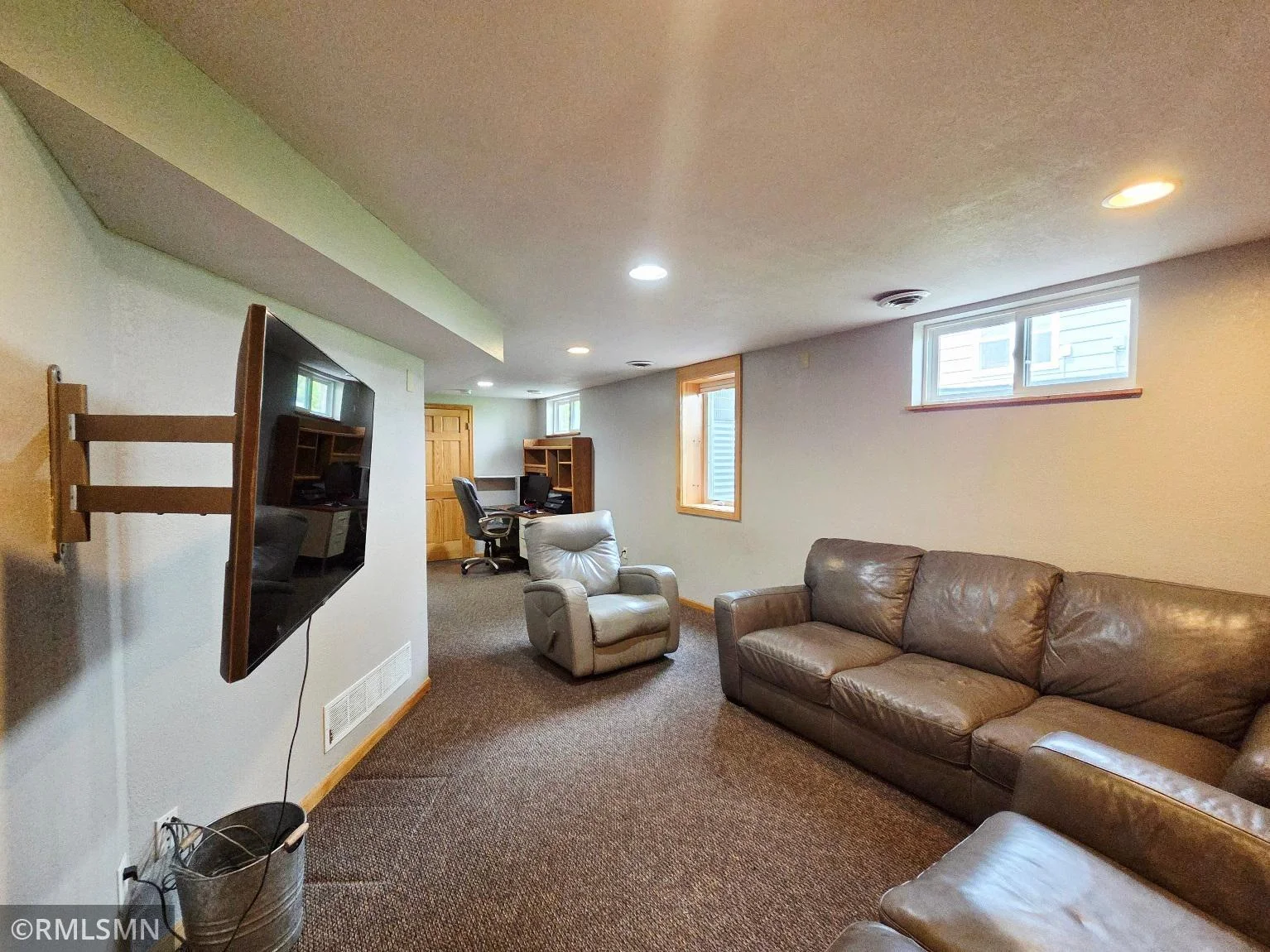 Gather, relax, and unwind in this cozy living space.