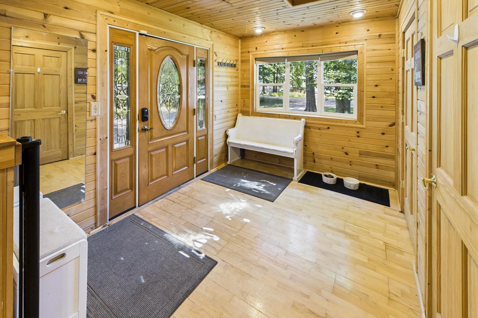 The main entry is a welcoming, open, bright first-impression to this home.