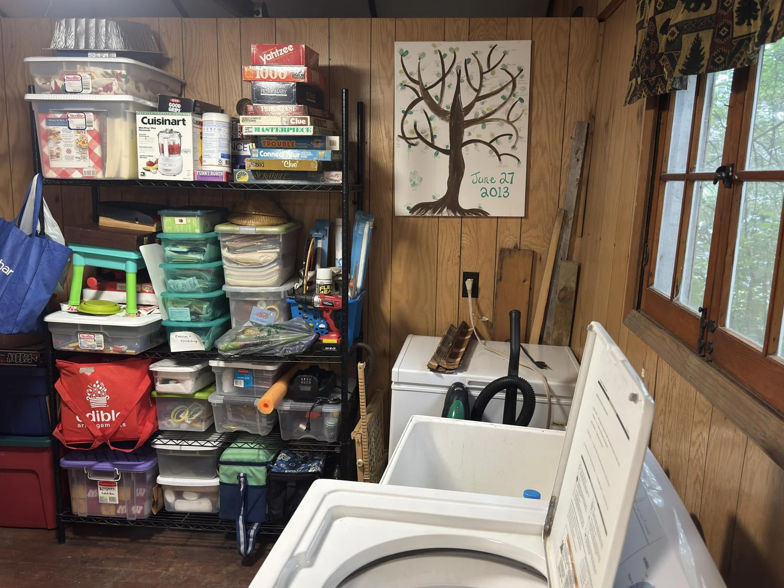 Red cabin storage space in laundry room