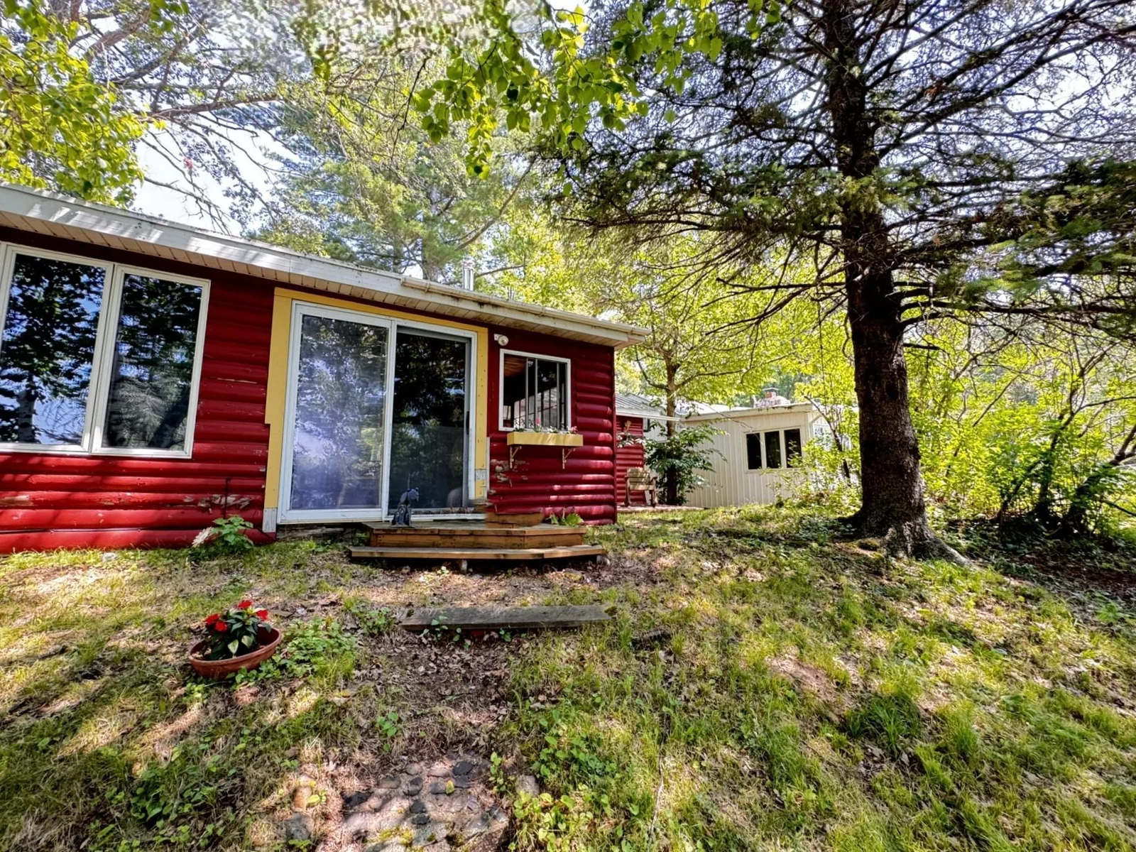 Two classic vintage lake cabins with 131' of lake frontage