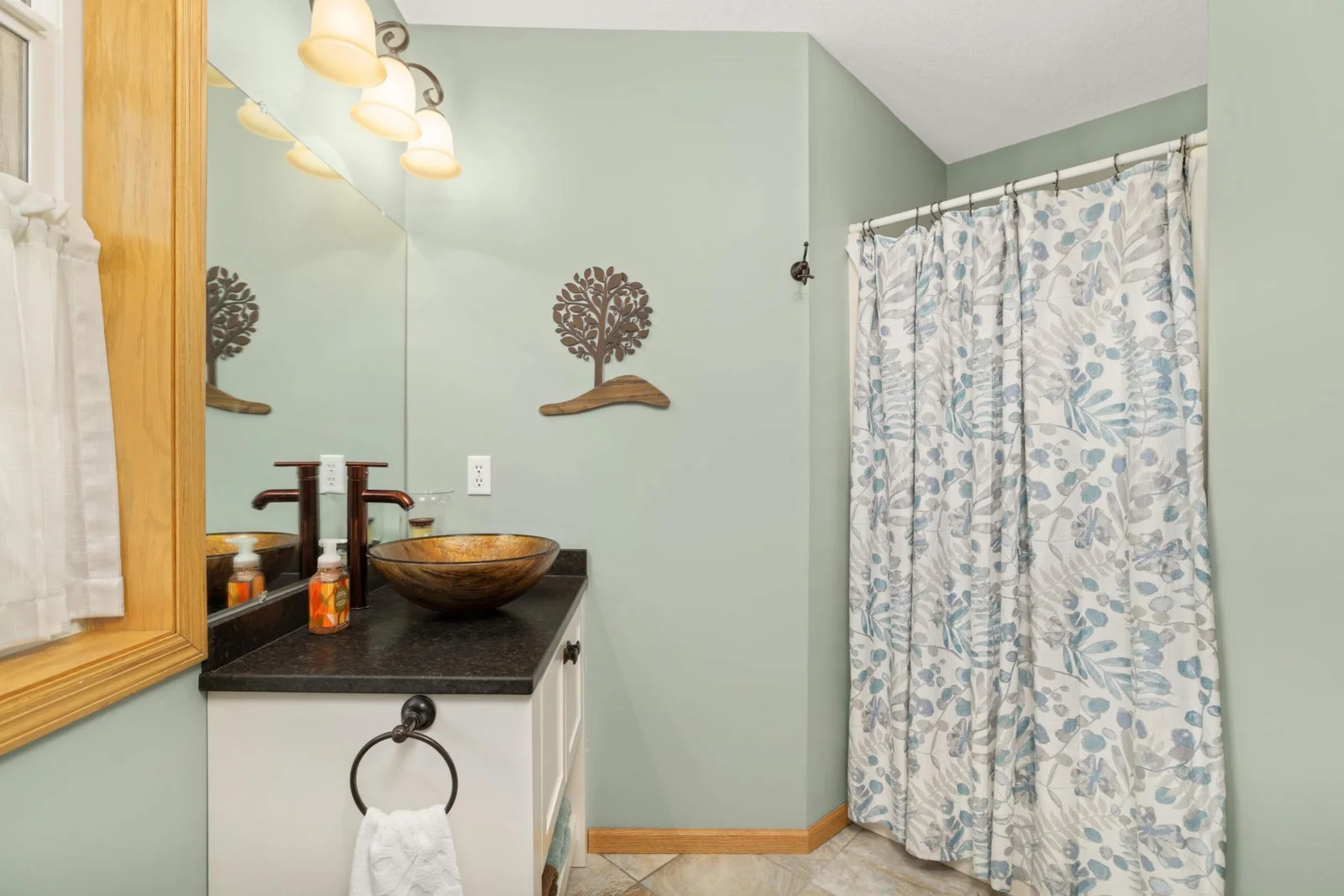 A touch of elegance to this 3/4 main level bath.