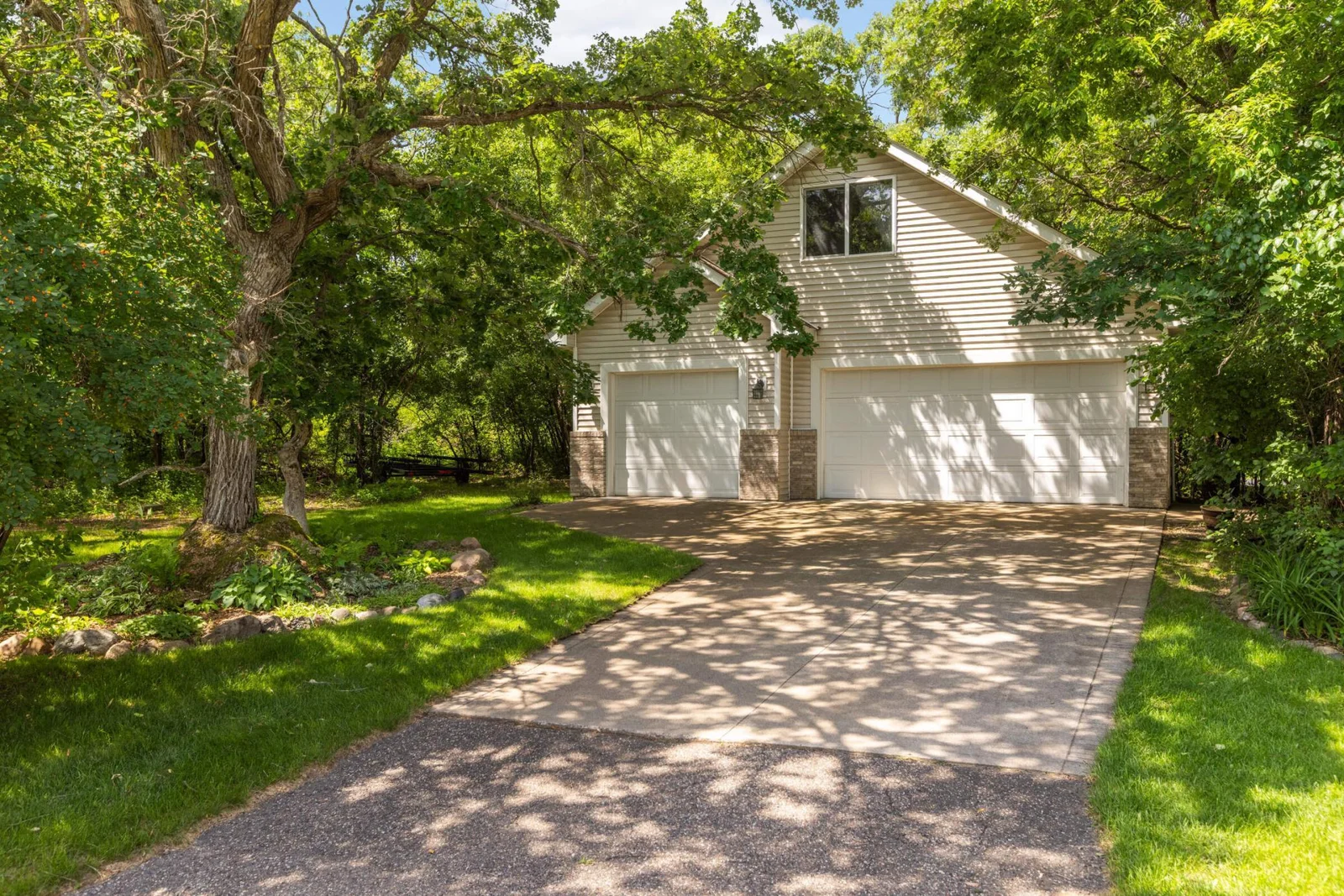 Three of the six garage stalls are ideal for cars, toys, or tools—extra deep with additional upper-level storage to keep everything organized and out of the way.