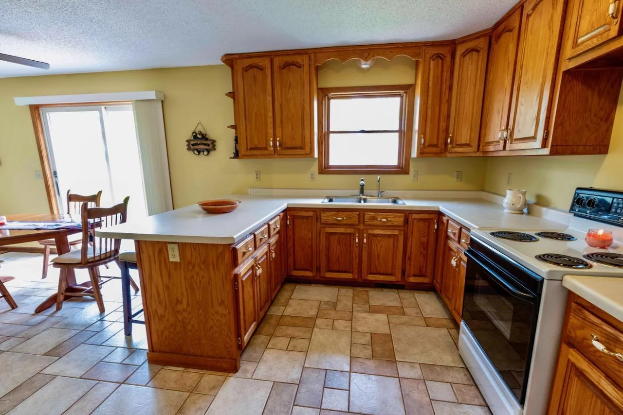 Kitchen that is open to dining and living rooms
