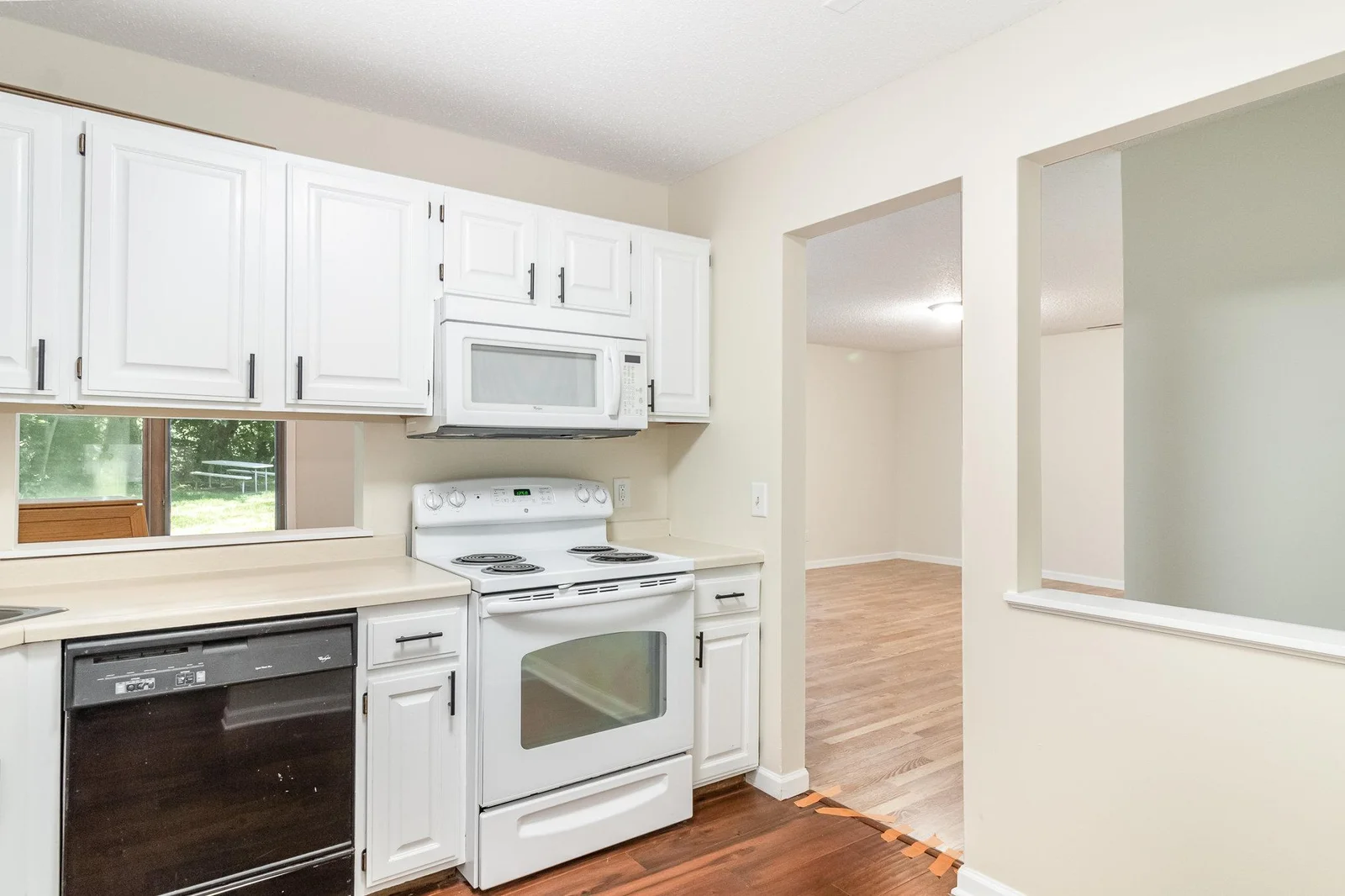 Kitchen with view to dining and living