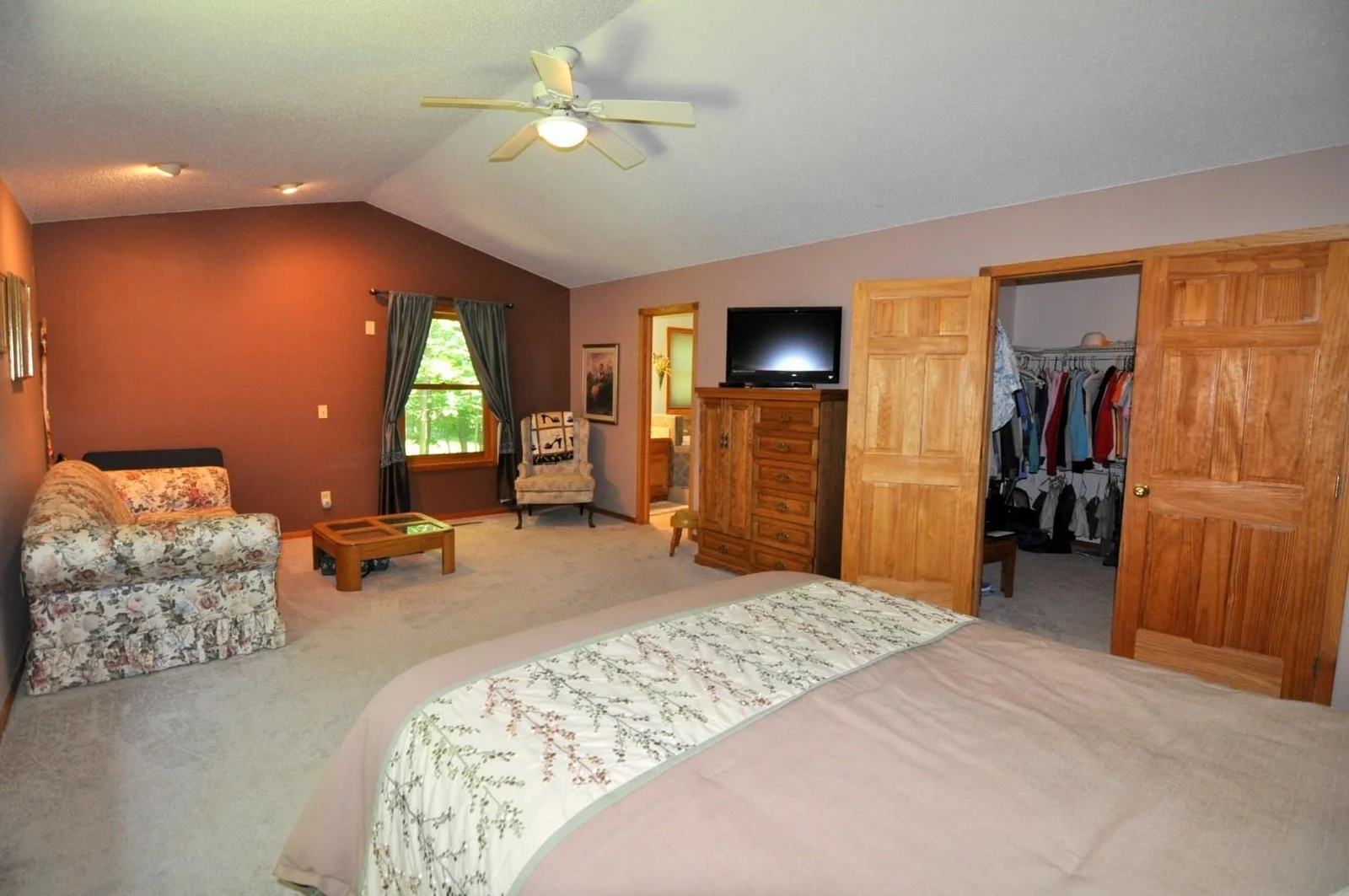 Primary bedroom offers an ensuite bathroom and spacious closet