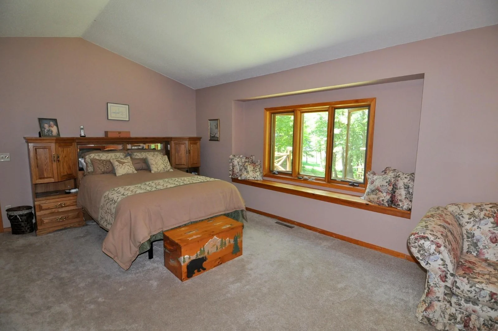Vaulted ceilings and large lakeside window