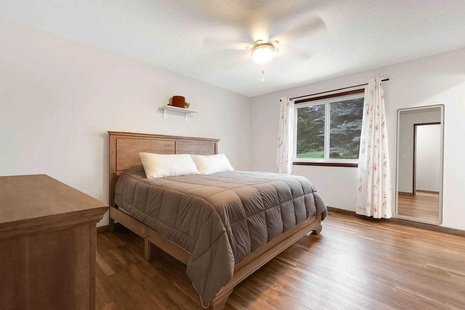 Main level bedroom.  **Photos have been edited to remove personal property**