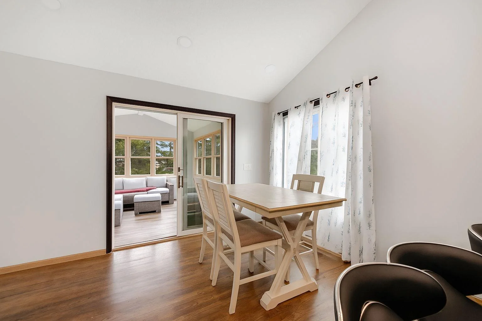 Dining room leads to the 4 season porch.  **Photos have been edited to remove personal property**