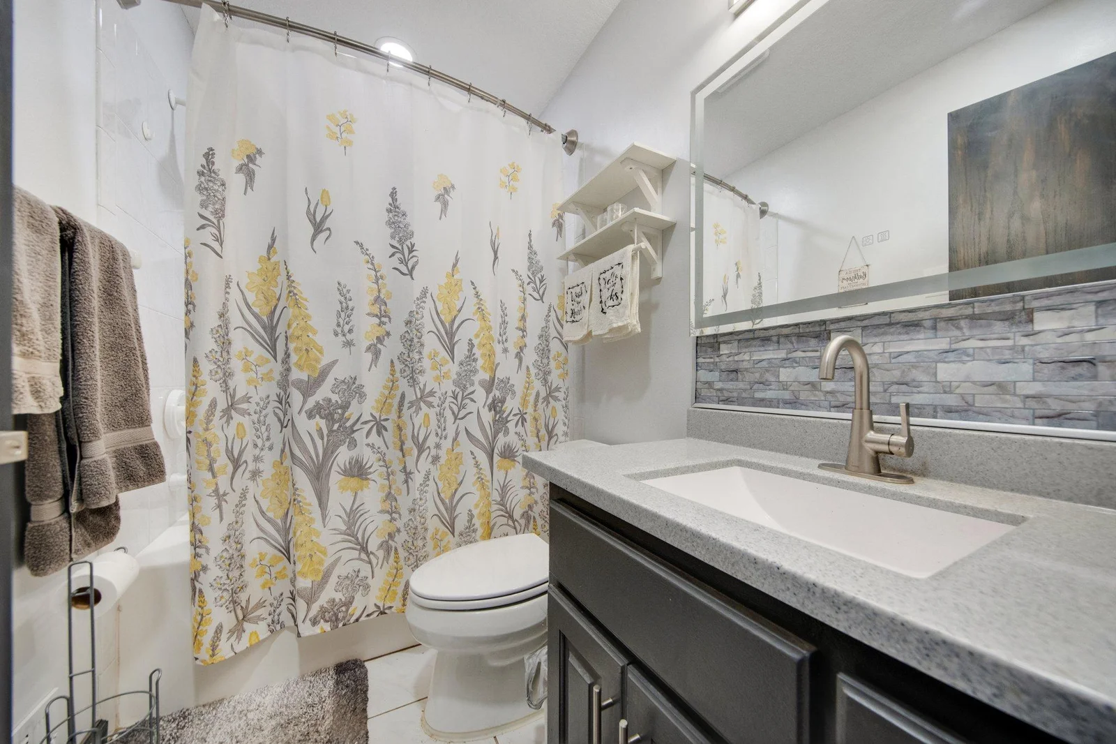 Main level full bathroom.