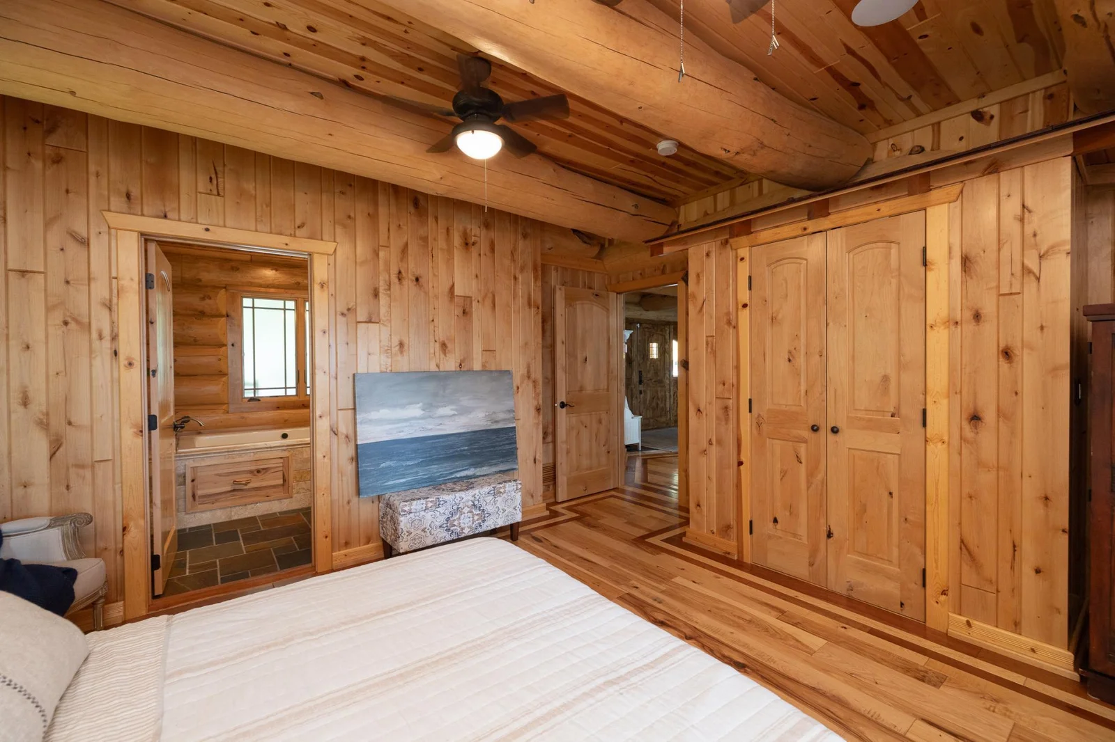 Primary bedroom with spacious closet and private full bath